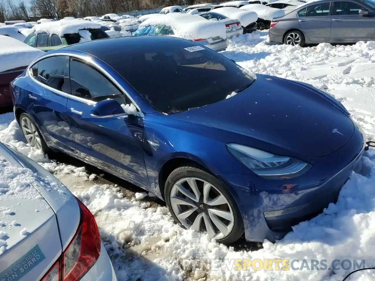 4 Photograph of a damaged car 5YJ3E1EB0LF712237 TESLA MODEL 3 2020