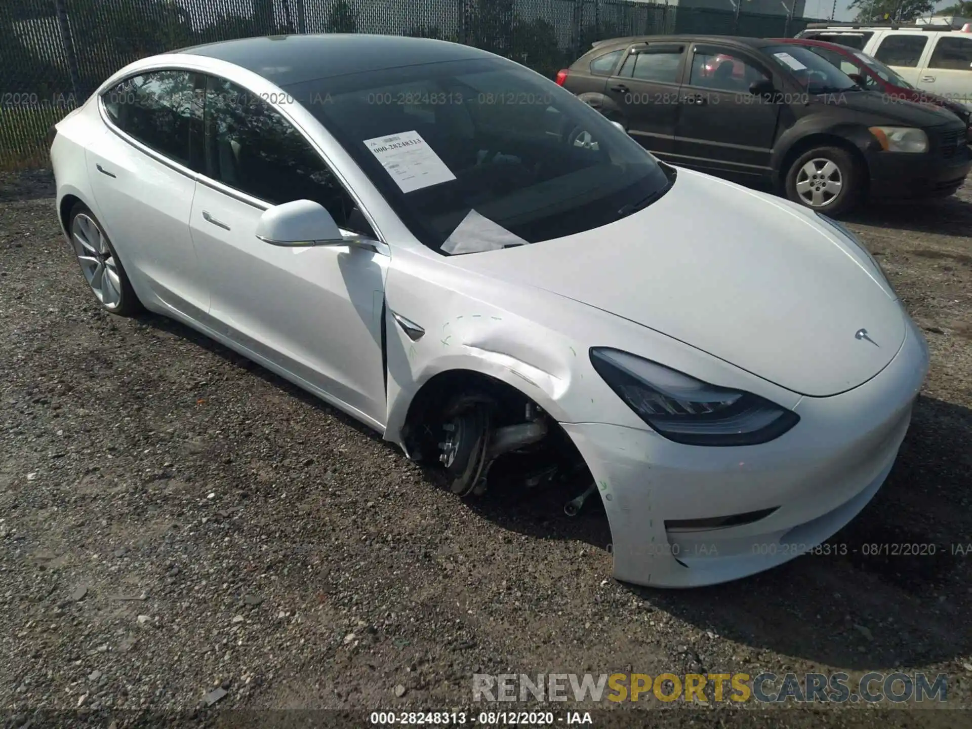 1 Photograph of a damaged car 5YJ3E1EB0LF712397 TESLA MODEL 3 2020