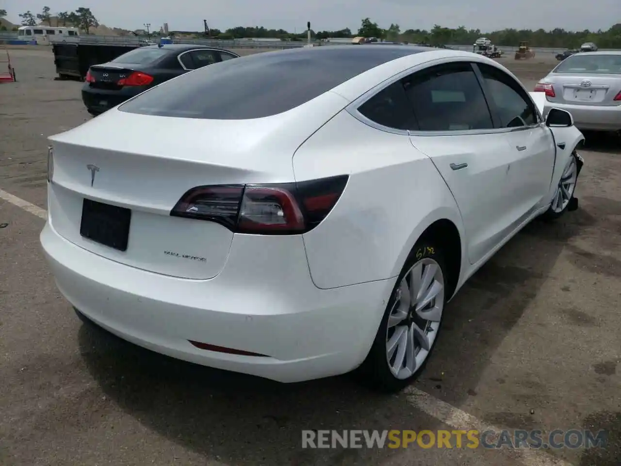 4 Photograph of a damaged car 5YJ3E1EB0LF719849 TESLA MODEL 3 2020