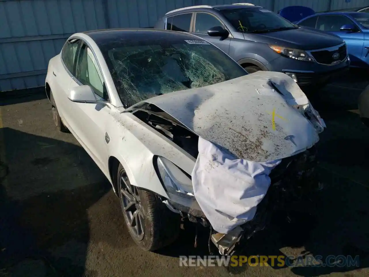 1 Photograph of a damaged car 5YJ3E1EB0LF720189 TESLA MODEL 3 2020