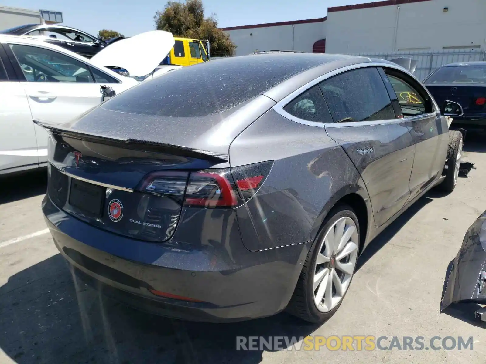 4 Photograph of a damaged car 5YJ3E1EB0LF721505 TESLA MODEL 3 2020