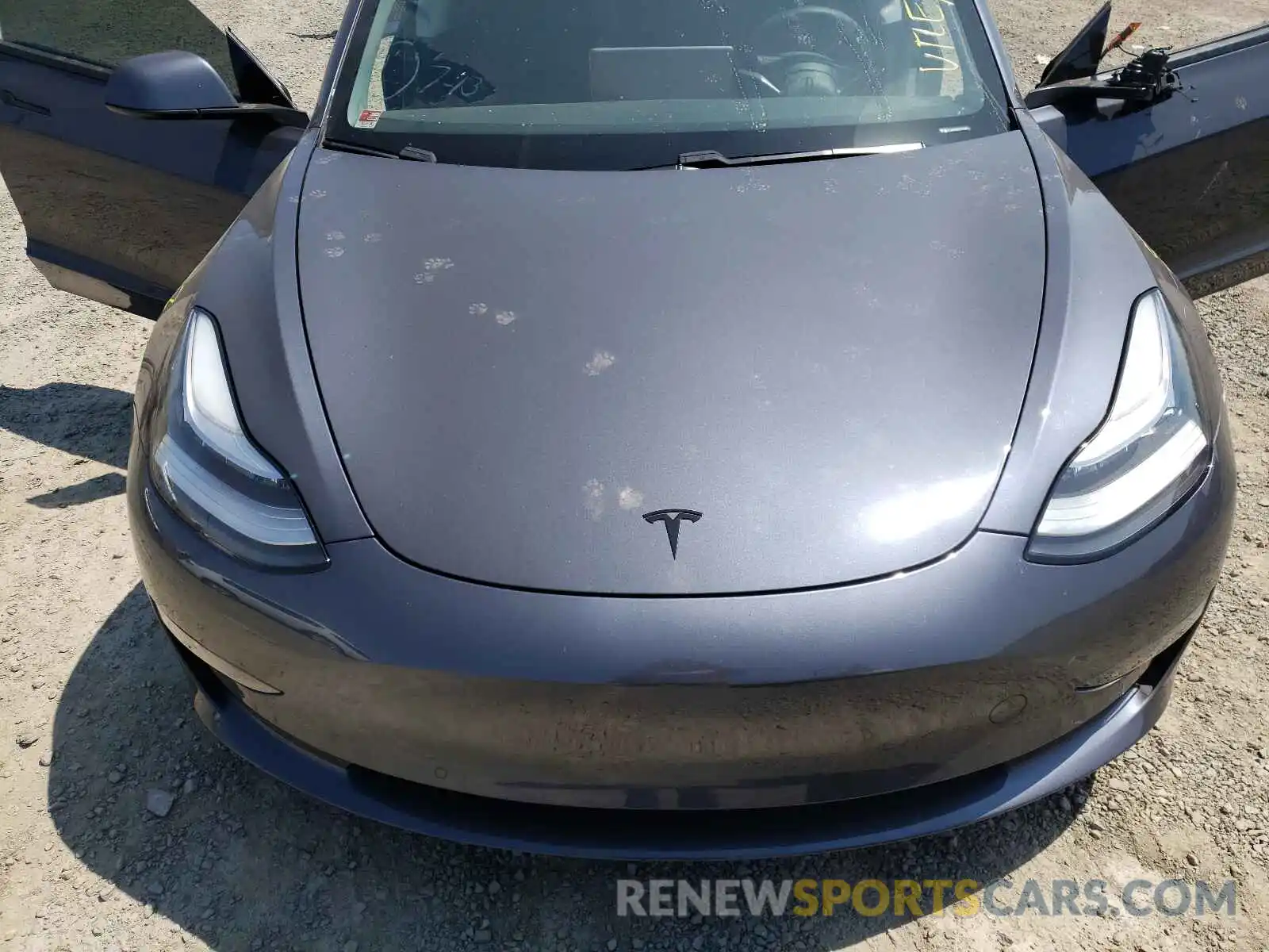 7 Photograph of a damaged car 5YJ3E1EB0LF735050 TESLA MODEL 3 2020