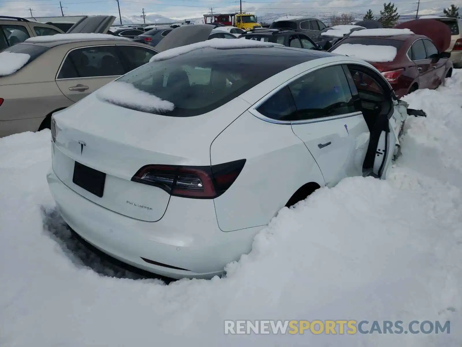 4 Photograph of a damaged car 5YJ3E1EB0LF735341 TESLA MODEL 3 2020