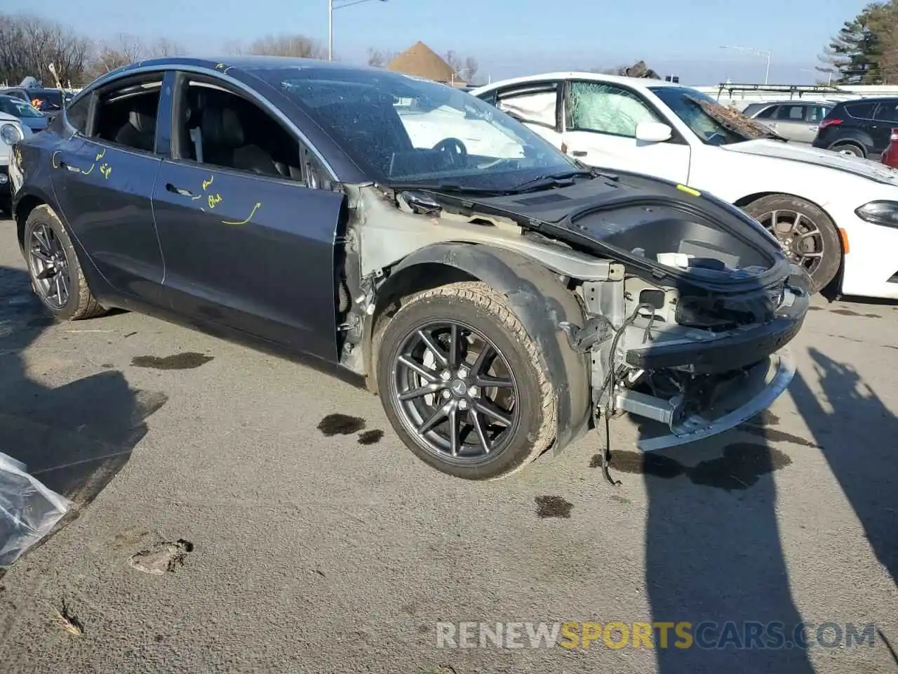 4 Photograph of a damaged car 5YJ3E1EB0LF774866 TESLA MODEL 3 2020