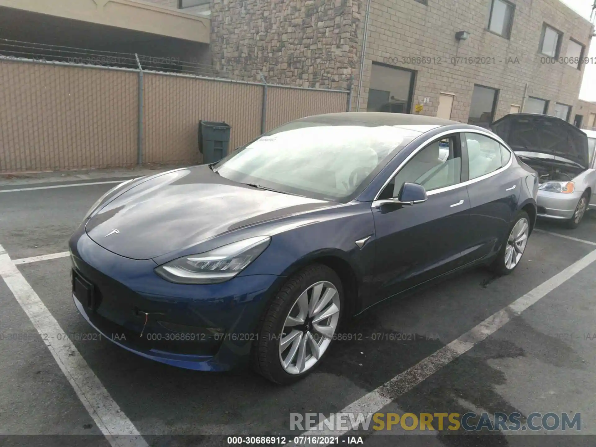 2 Photograph of a damaged car 5YJ3E1EB0LF796057 TESLA MODEL 3 2020