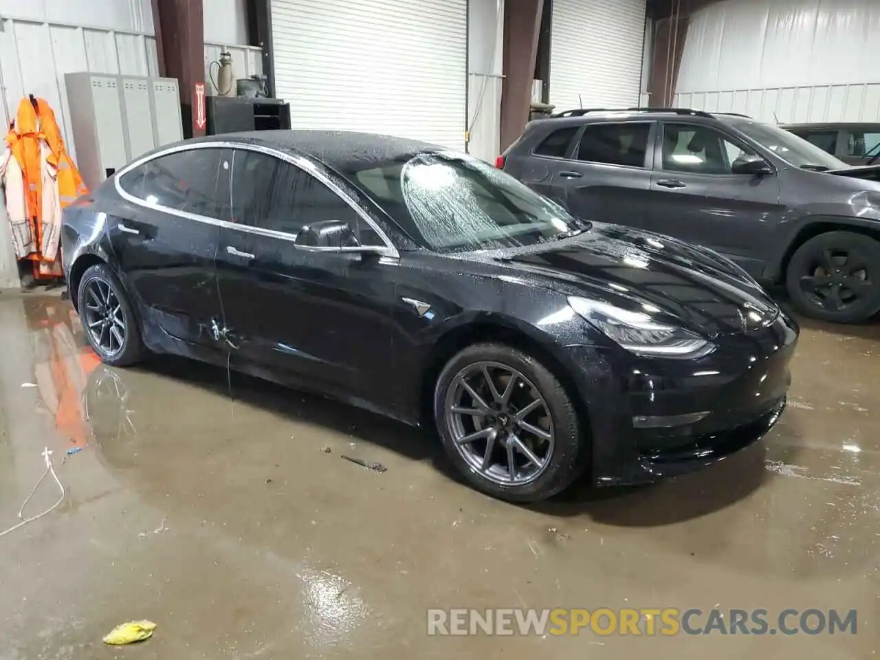 4 Photograph of a damaged car 5YJ3E1EB1LF600160 TESLA MODEL 3 2020