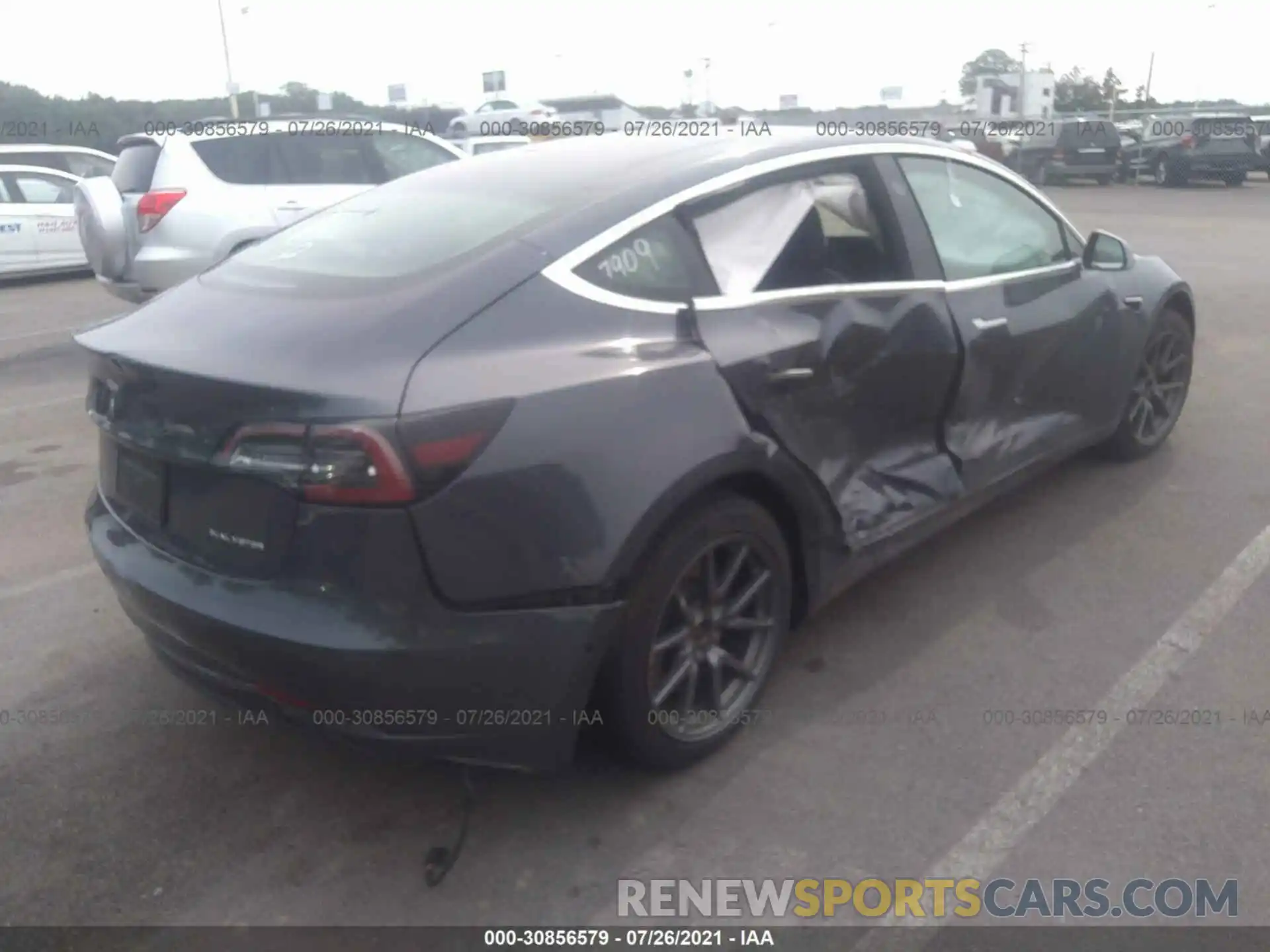 4 Photograph of a damaged car 5YJ3E1EB1LF616231 TESLA MODEL 3 2020