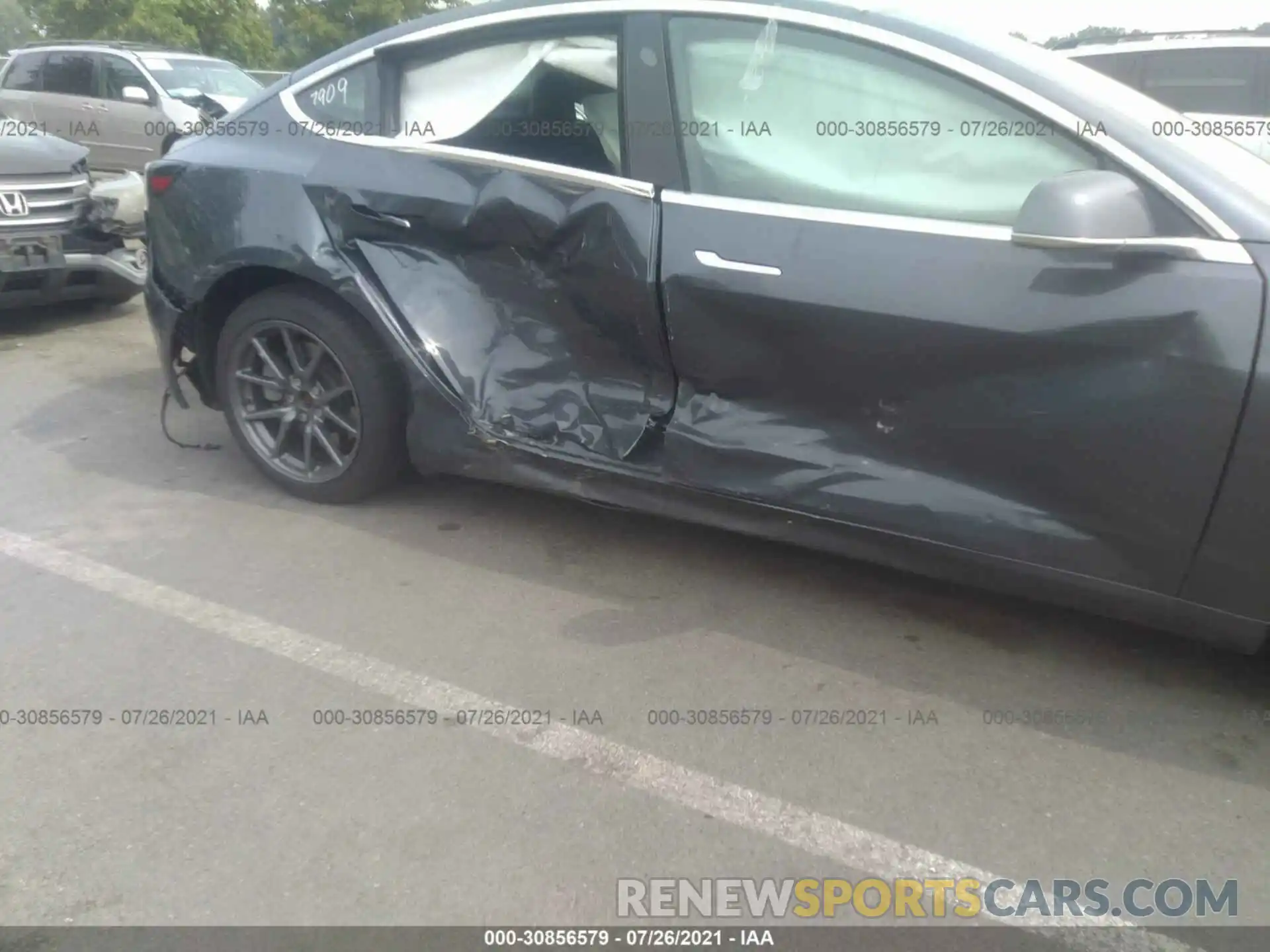 6 Photograph of a damaged car 5YJ3E1EB1LF616231 TESLA MODEL 3 2020