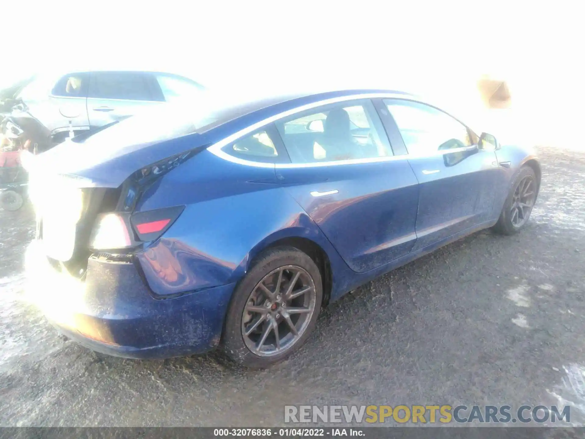 4 Photograph of a damaged car 5YJ3E1EB1LF617167 TESLA MODEL 3 2020