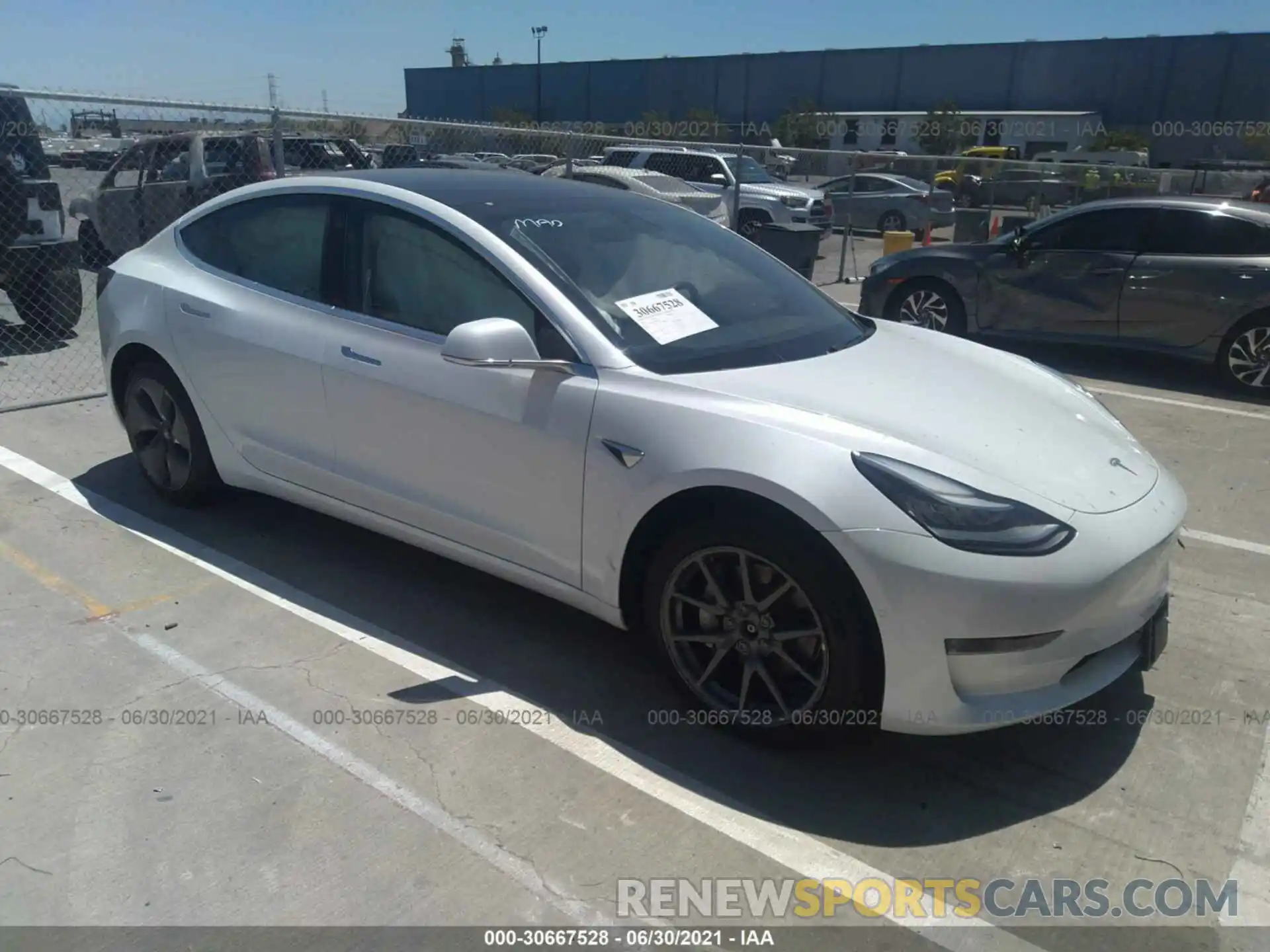 1 Photograph of a damaged car 5YJ3E1EB1LF618318 TESLA MODEL 3 2020