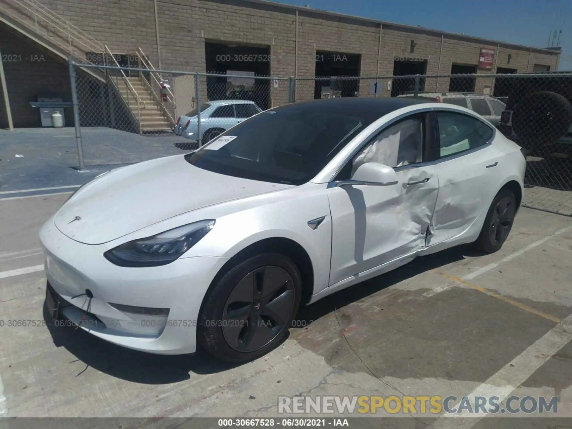 2 Photograph of a damaged car 5YJ3E1EB1LF618318 TESLA MODEL 3 2020