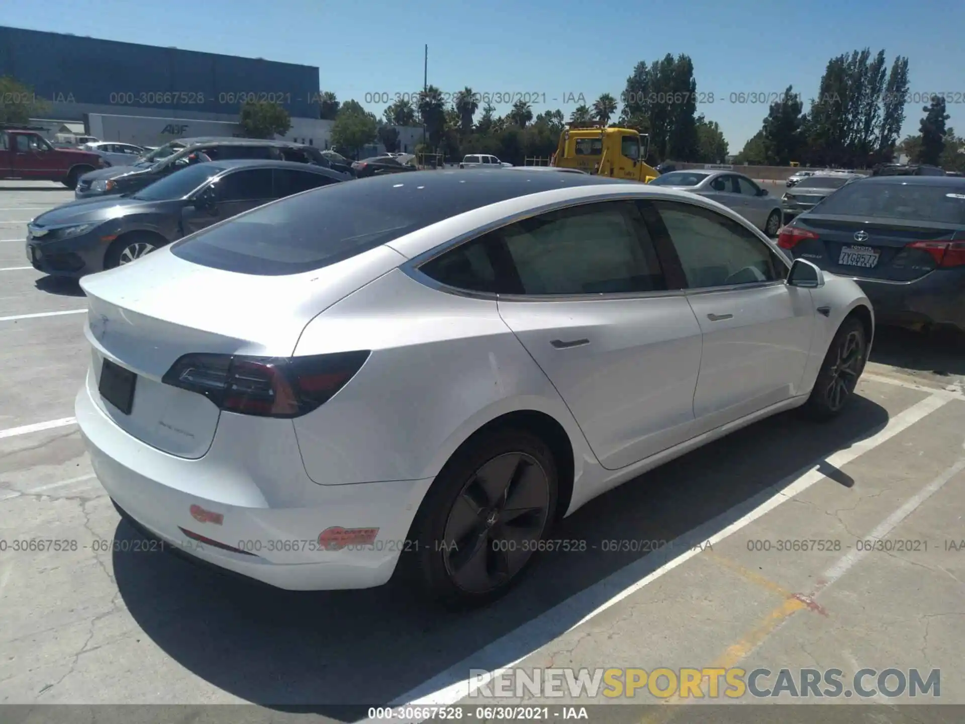 4 Photograph of a damaged car 5YJ3E1EB1LF618318 TESLA MODEL 3 2020