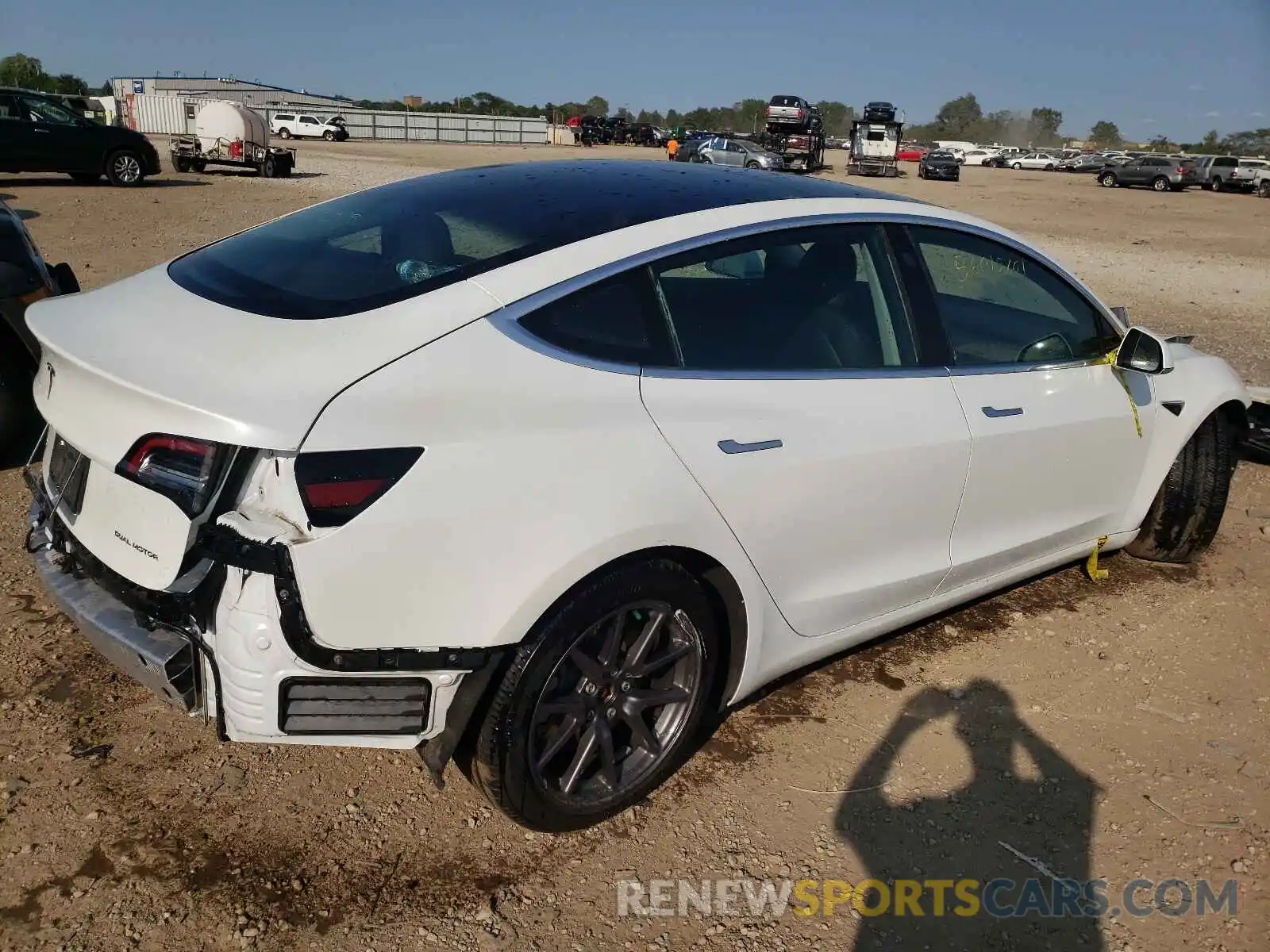 4 Photograph of a damaged car 5YJ3E1EB1LF618612 TESLA MODEL 3 2020