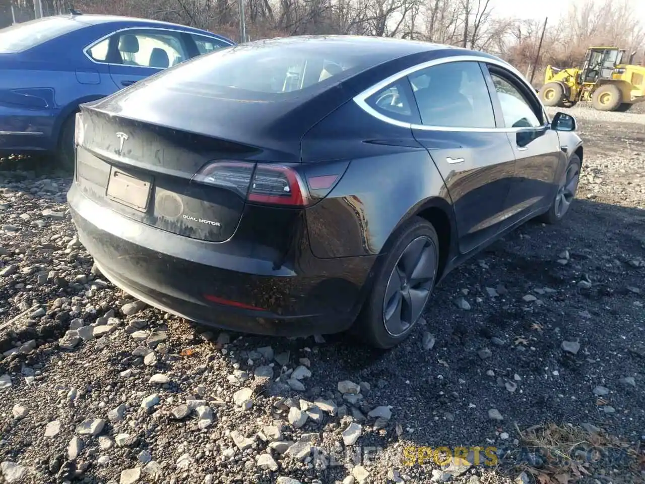 4 Photograph of a damaged car 5YJ3E1EB1LF635135 TESLA MODEL 3 2020