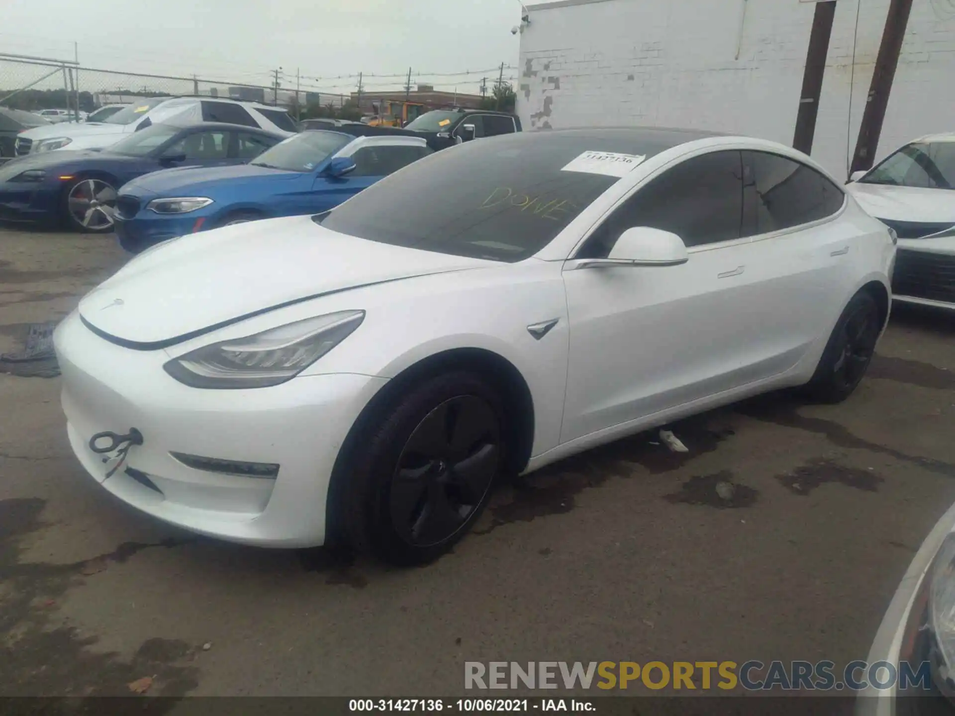 2 Photograph of a damaged car 5YJ3E1EB1LF637323 TESLA MODEL 3 2020