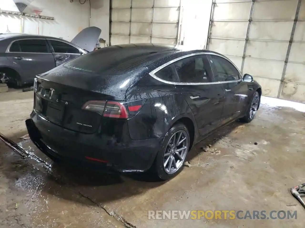 4 Photograph of a damaged car 5YJ3E1EB1LF647169 TESLA MODEL 3 2020