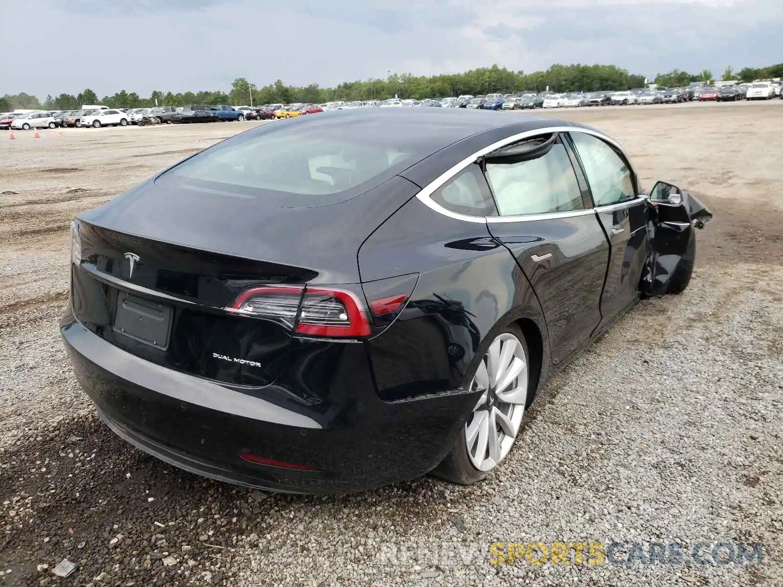 4 Photograph of a damaged car 5YJ3E1EB1LF666224 TESLA MODEL 3 2020