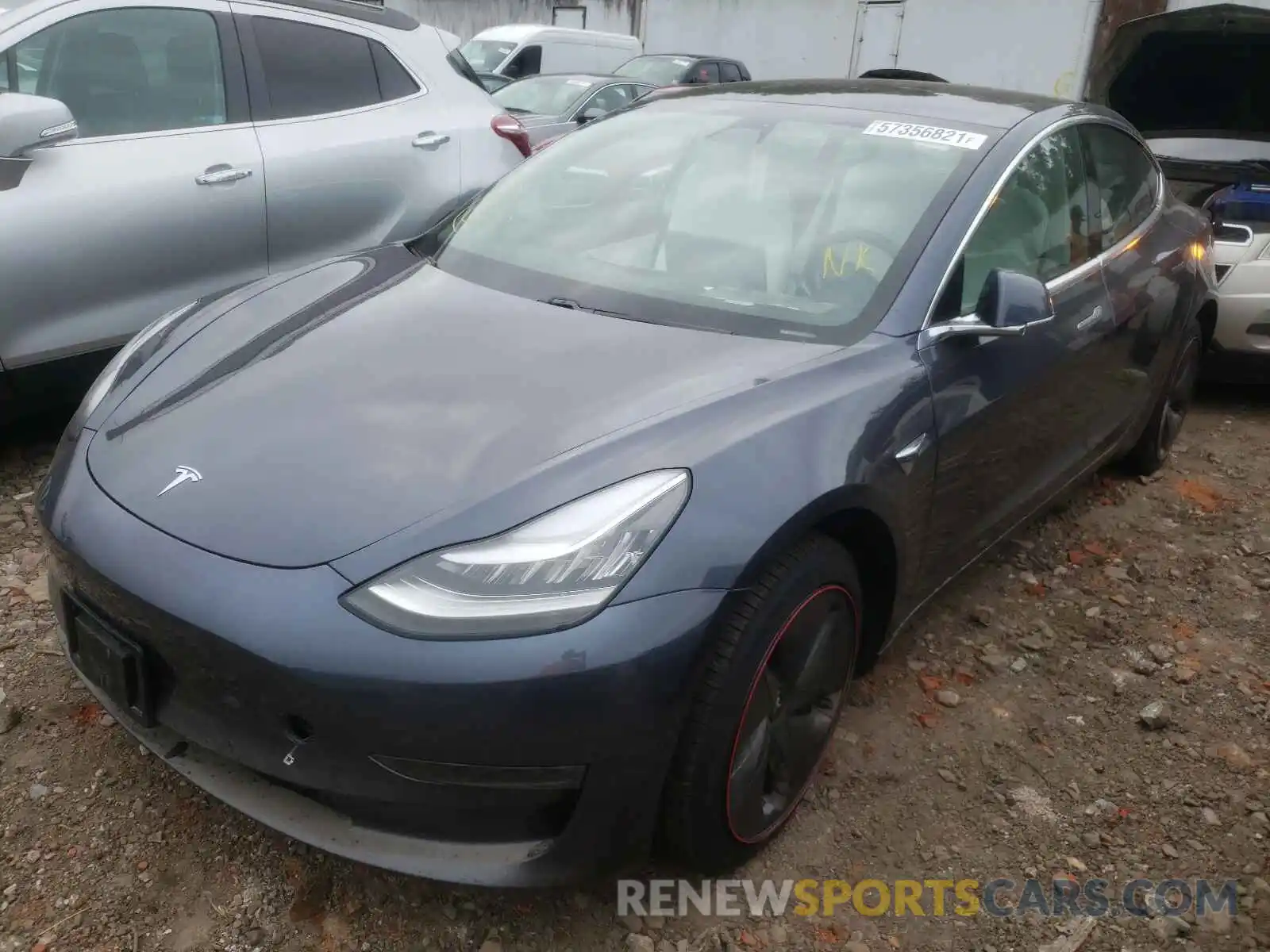 2 Photograph of a damaged car 5YJ3E1EB1LF668121 TESLA MODEL 3 2020