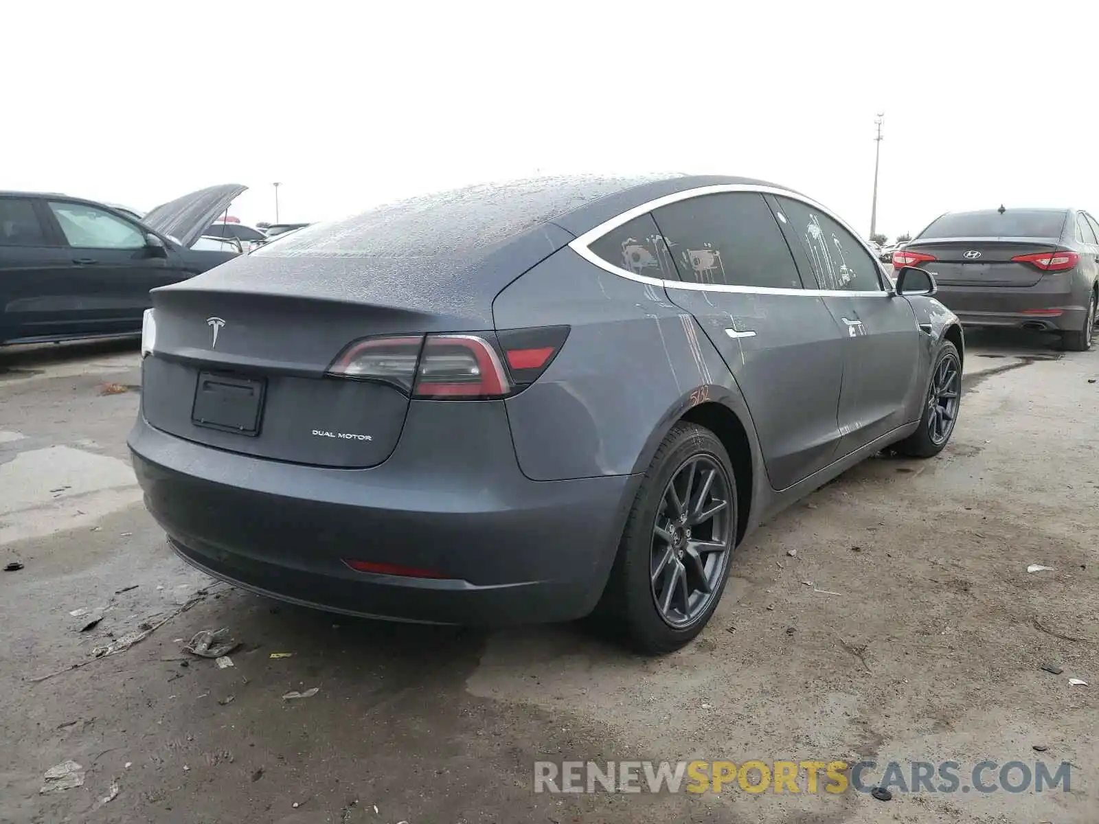 4 Photograph of a damaged car 5YJ3E1EB1LF735011 TESLA MODEL 3 2020