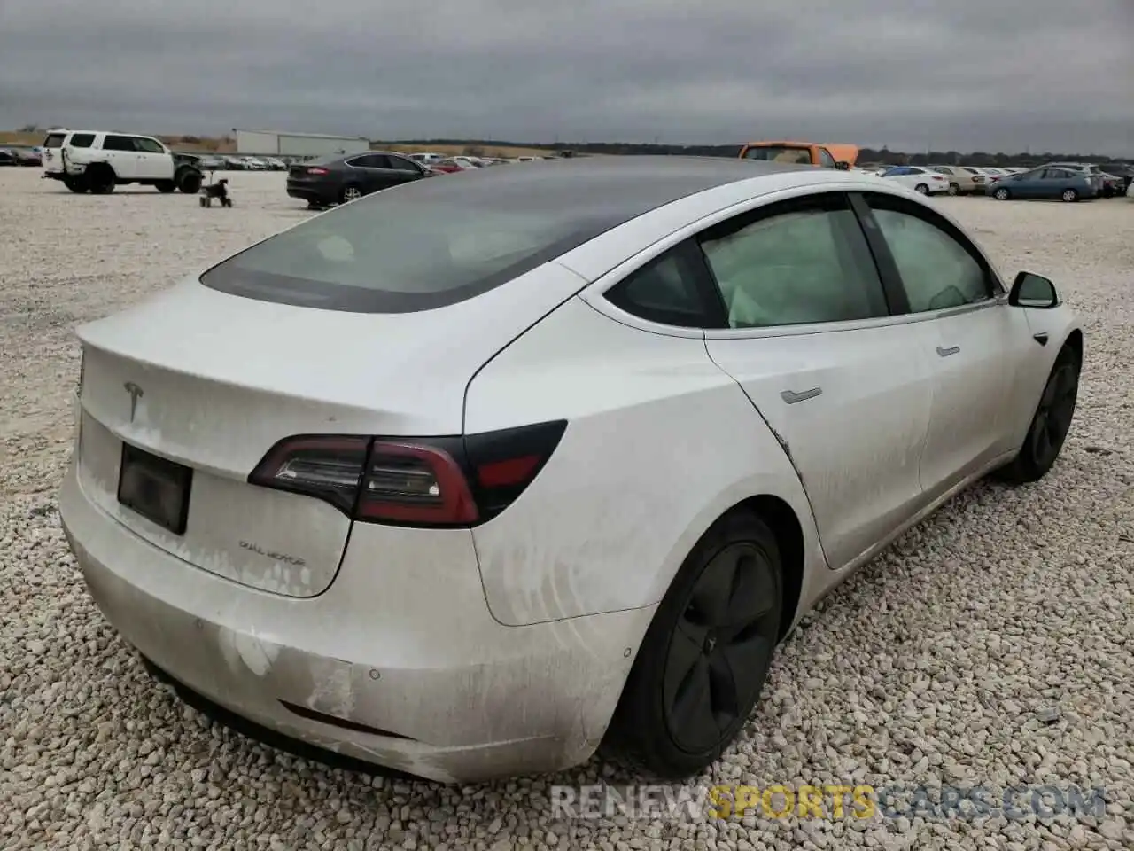 4 Photograph of a damaged car 5YJ3E1EB1LF741584 TESLA MODEL 3 2020