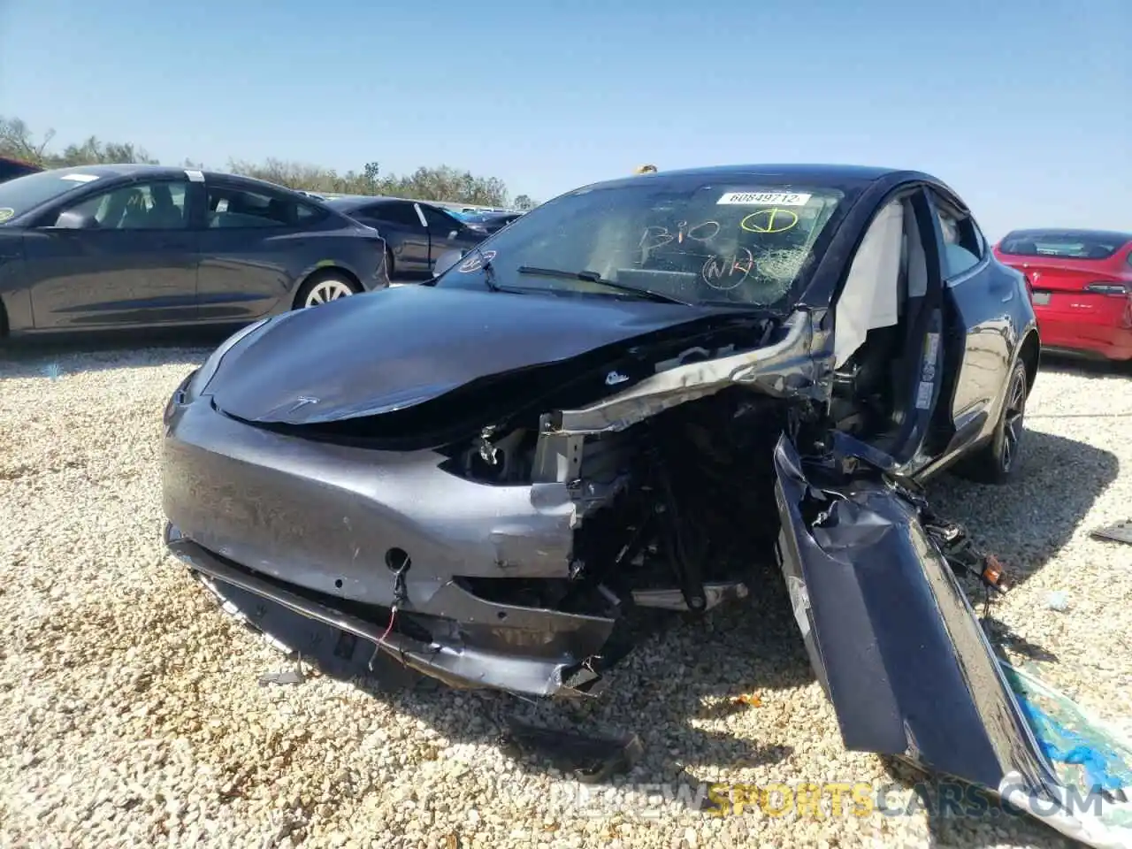 2 Photograph of a damaged car 5YJ3E1EB1LF793572 TESLA MODEL 3 2020