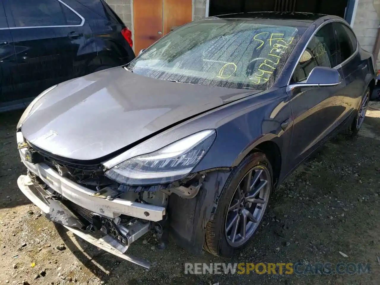 2 Photograph of a damaged car 5YJ3E1EB1LF794835 TESLA MODEL 3 2020