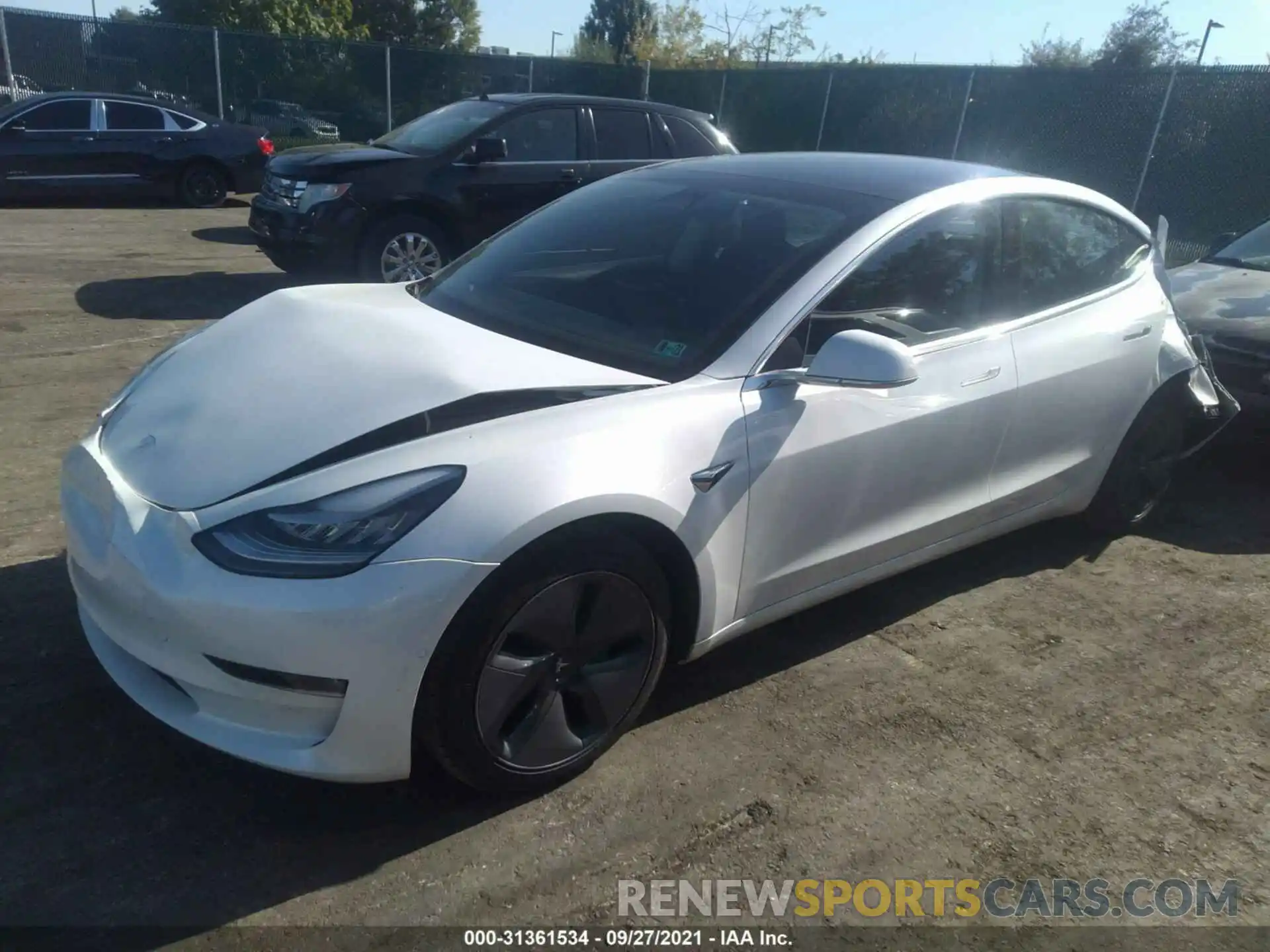 2 Photograph of a damaged car 5YJ3E1EB1LF795130 TESLA MODEL 3 2020