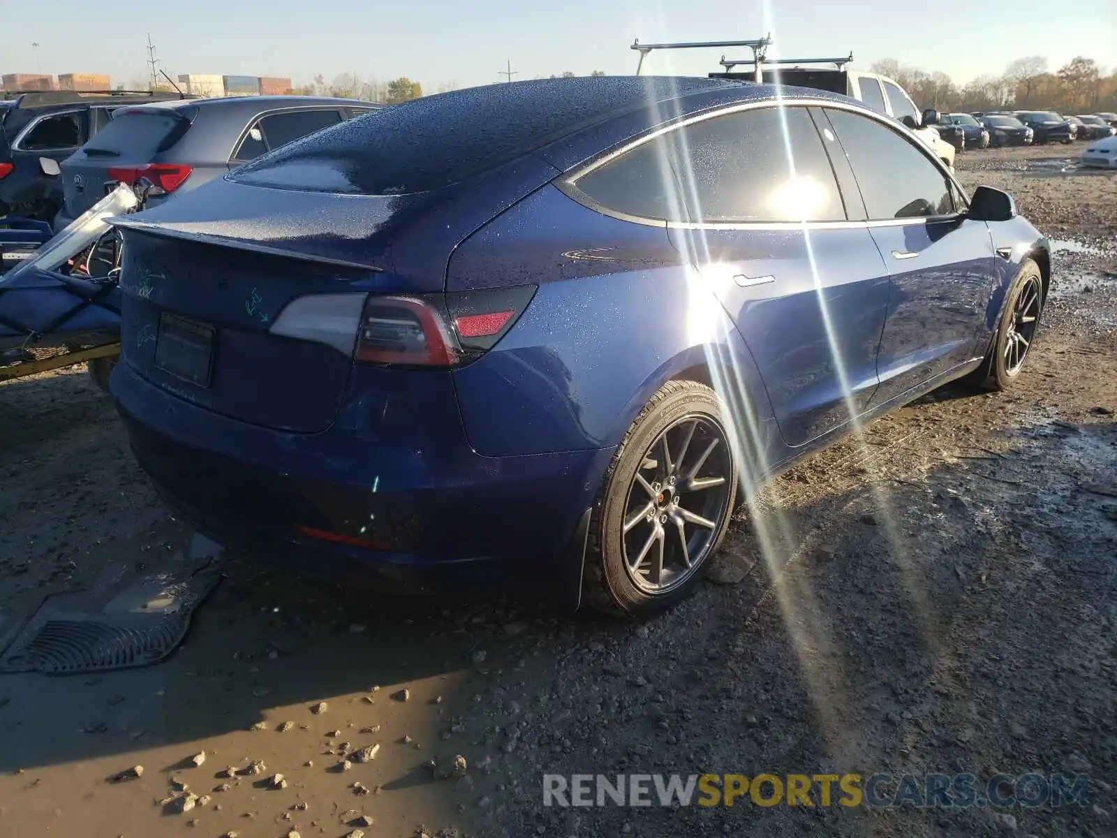 4 Photograph of a damaged car 5YJ3E1EB1LF795774 TESLA MODEL 3 2020