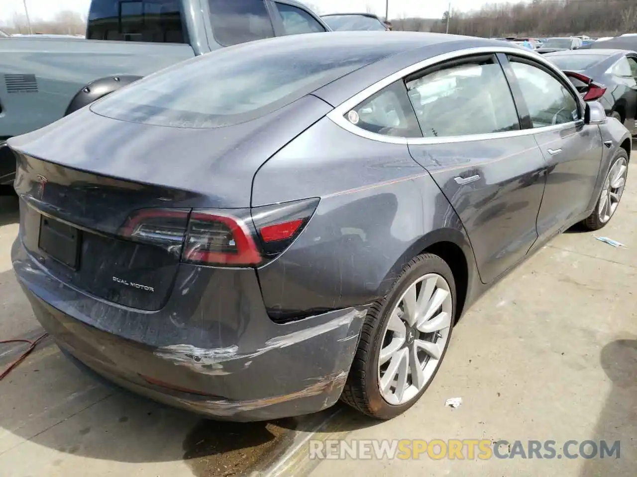 4 Photograph of a damaged car 5YJ3E1EB1LF795984 TESLA MODEL 3 2020