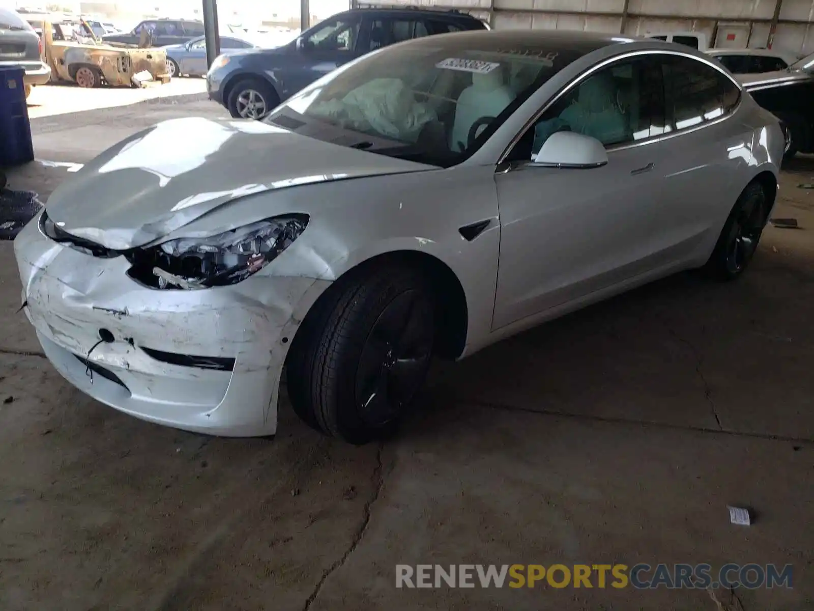 2 Photograph of a damaged car 5YJ3E1EB1LF806689 TESLA MODEL 3 2020