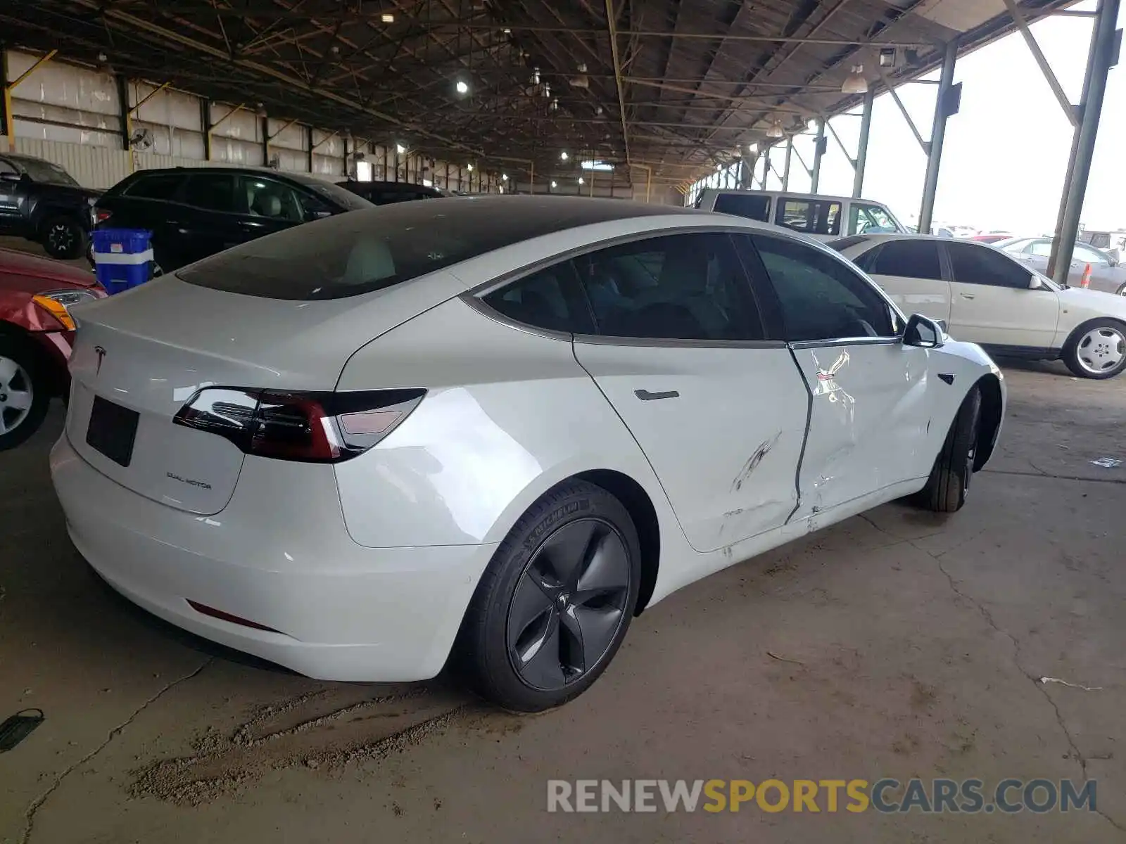 4 Photograph of a damaged car 5YJ3E1EB1LF806689 TESLA MODEL 3 2020