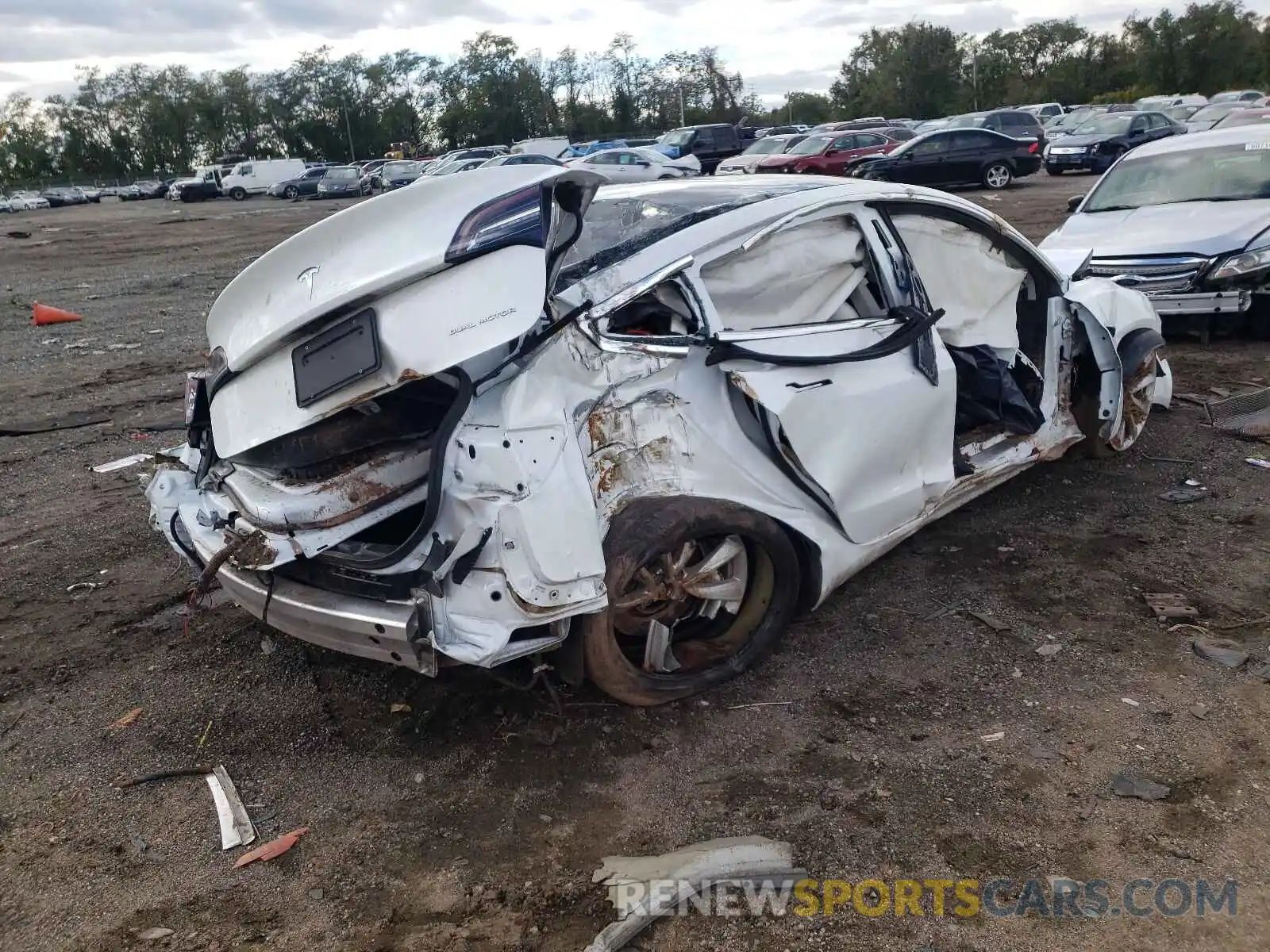 4 Photograph of a damaged car 5YJ3E1EB2LF513593 TESLA MODEL 3 2020