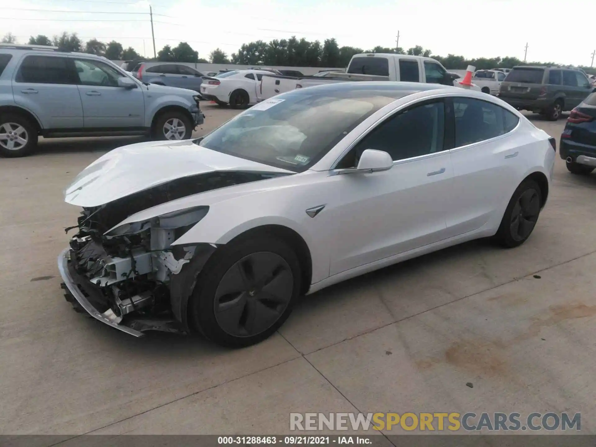 2 Photograph of a damaged car 5YJ3E1EB2LF520995 TESLA MODEL 3 2020