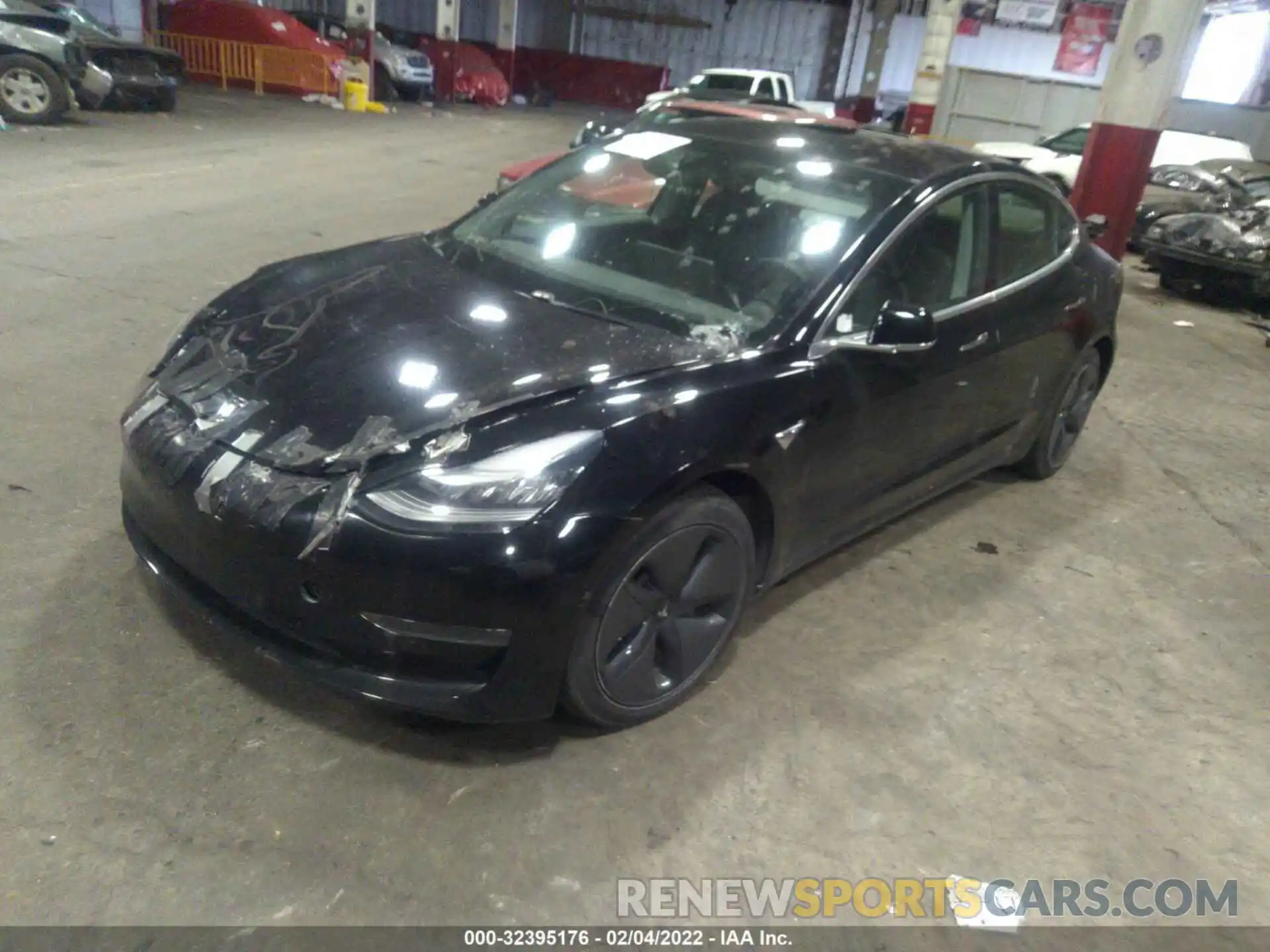 2 Photograph of a damaged car 5YJ3E1EB2LF600099 TESLA MODEL 3 2020