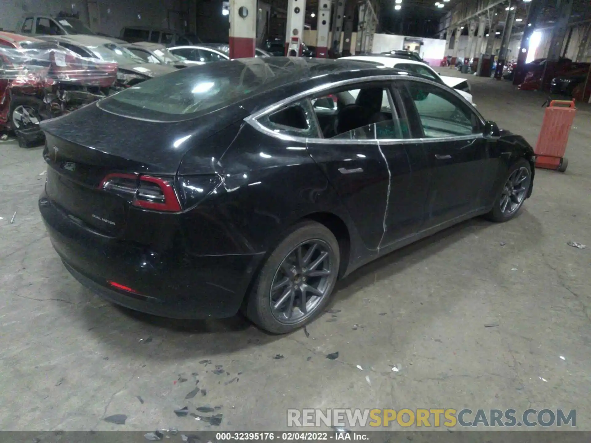 4 Photograph of a damaged car 5YJ3E1EB2LF600099 TESLA MODEL 3 2020