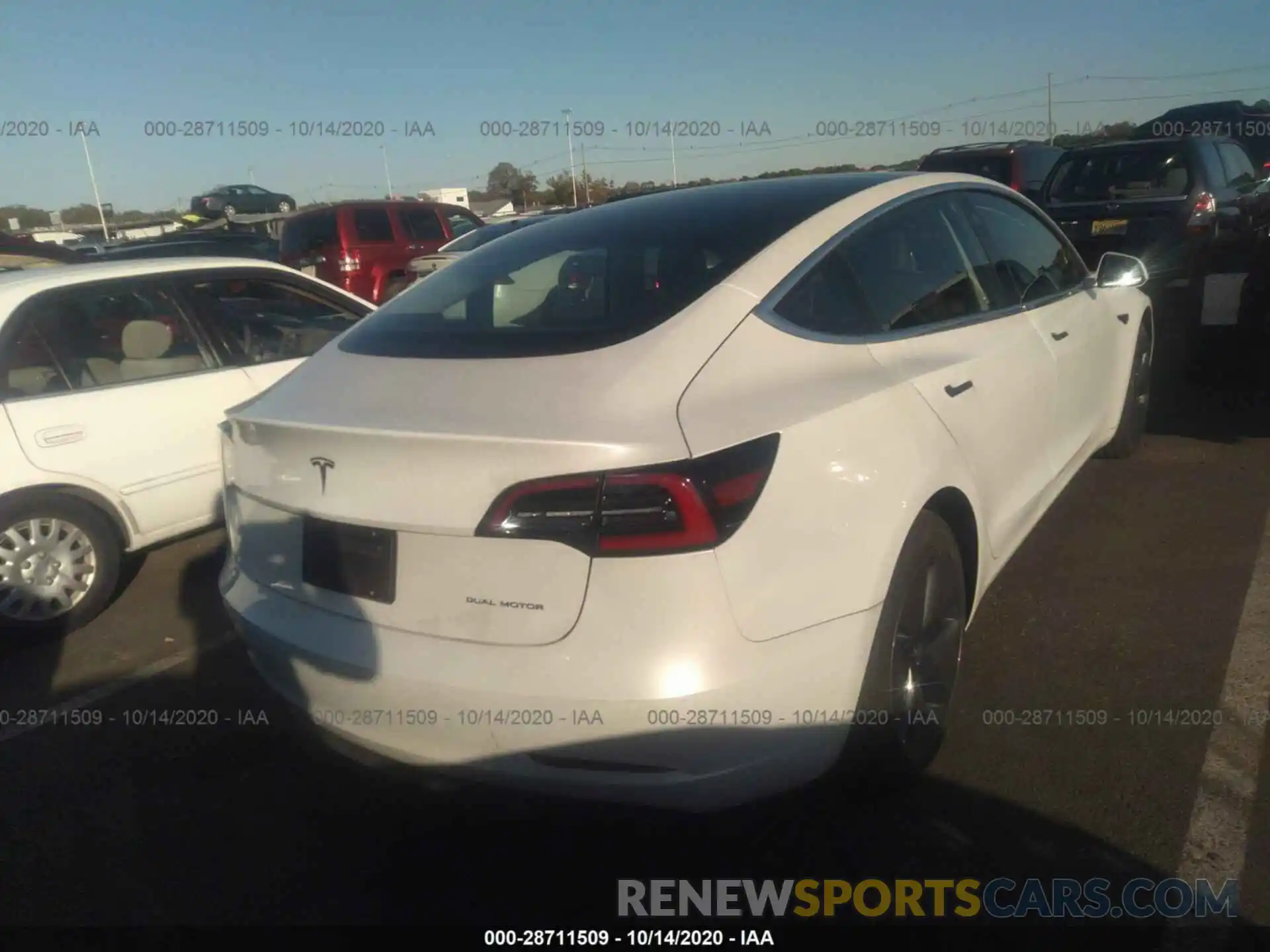 4 Photograph of a damaged car 5YJ3E1EB2LF617985 TESLA MODEL 3 2020