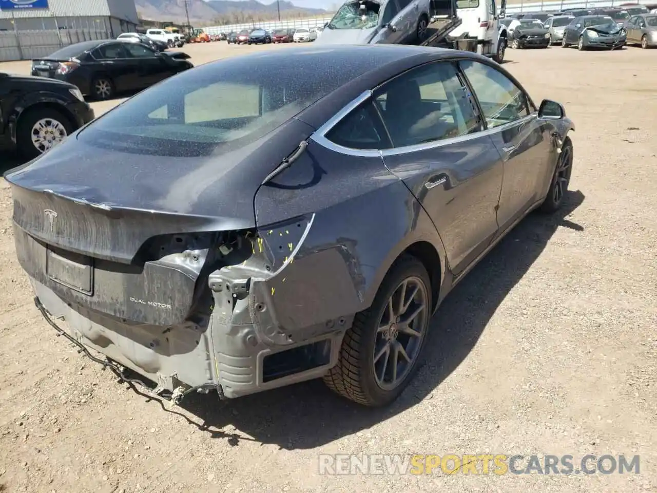 4 Photograph of a damaged car 5YJ3E1EB2LF635449 TESLA MODEL 3 2020