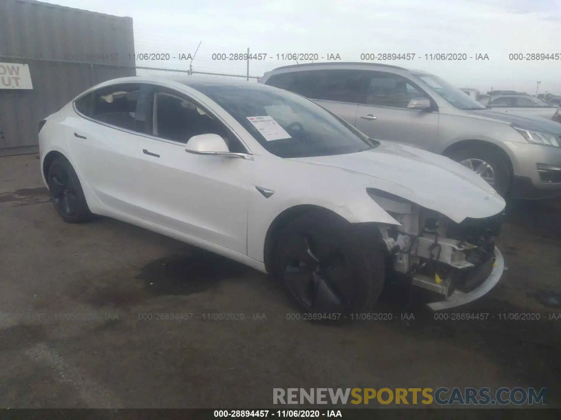 1 Photograph of a damaged car 5YJ3E1EB2LF636598 TESLA MODEL 3 2020