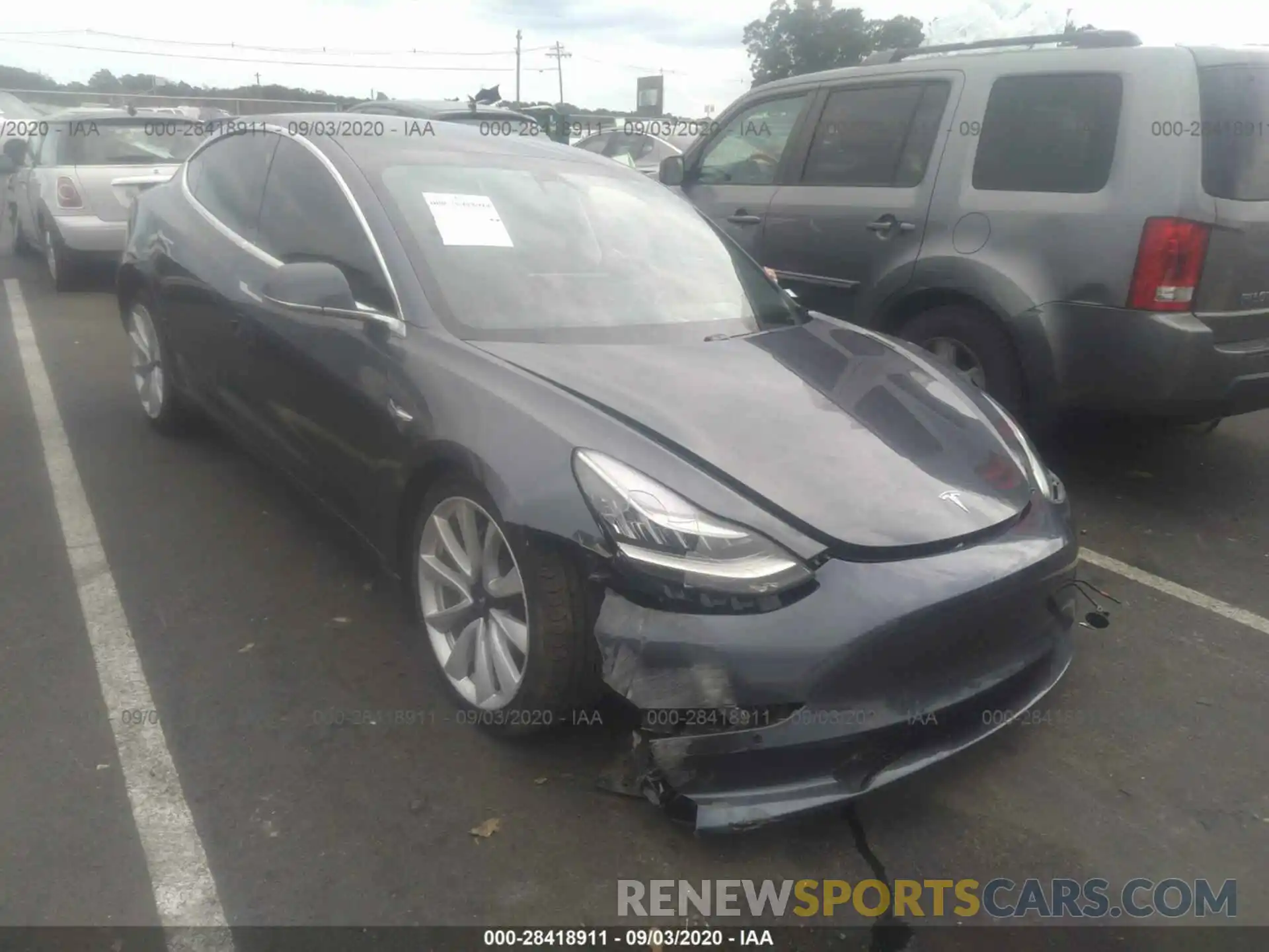 1 Photograph of a damaged car 5YJ3E1EB2LF638125 TESLA MODEL 3 2020