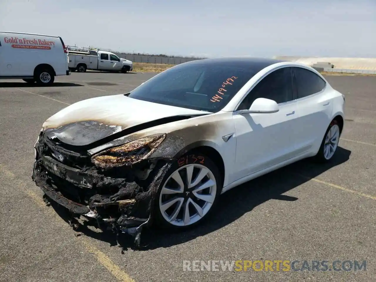 2 Photograph of a damaged car 5YJ3E1EB2LF638433 TESLA MODEL 3 2020