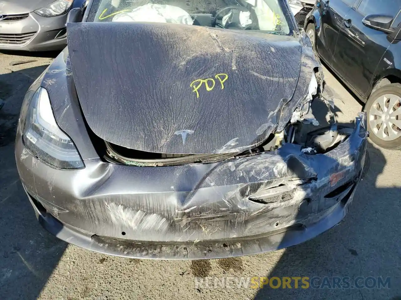 7 Photograph of a damaged car 5YJ3E1EB2LF647908 TESLA MODEL 3 2020