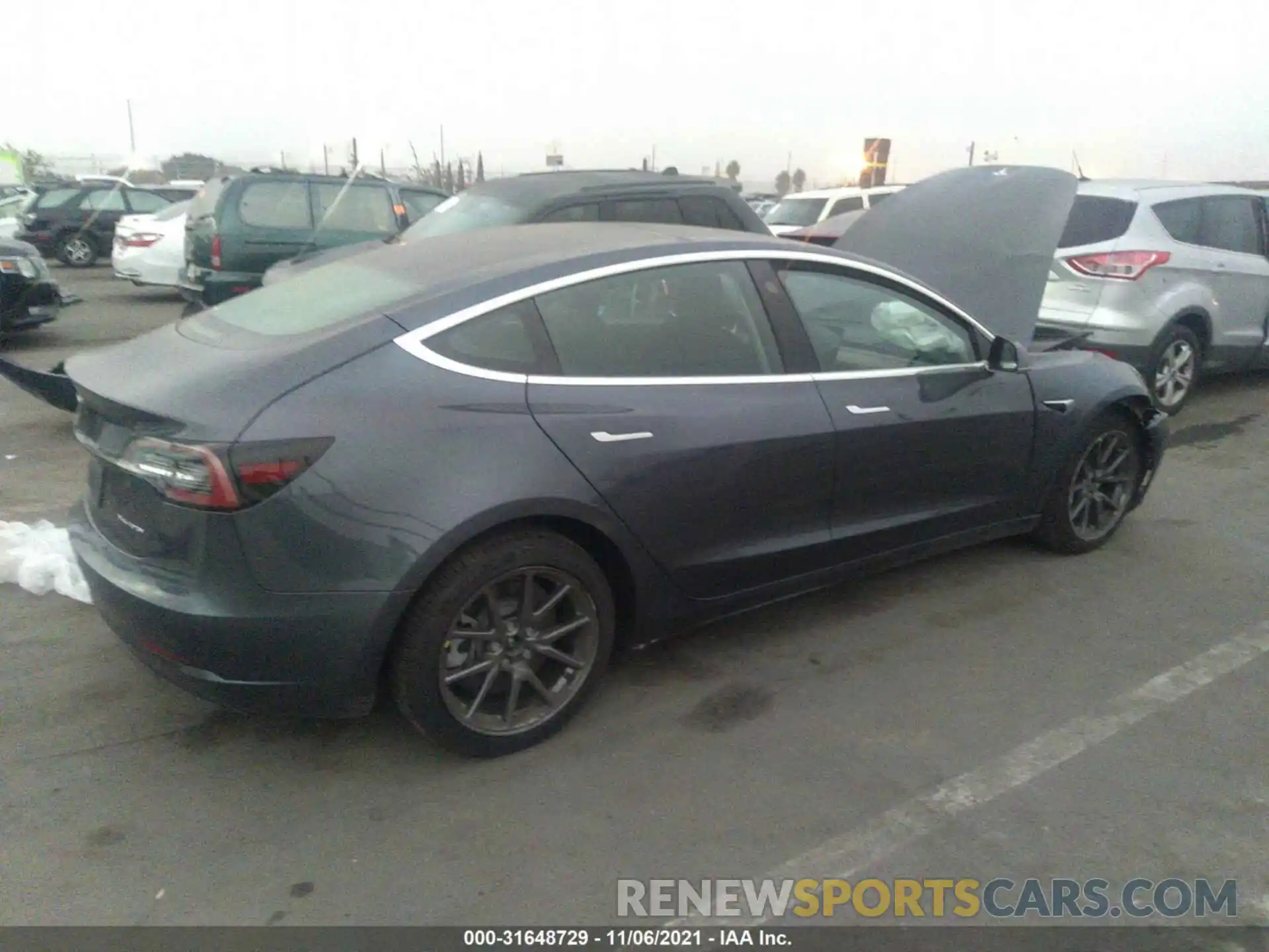 4 Photograph of a damaged car 5YJ3E1EB2LF649755 TESLA MODEL 3 2020