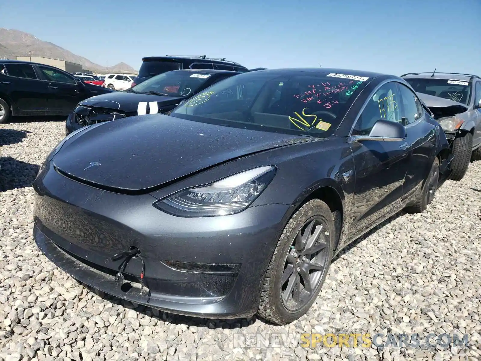 2 Photograph of a damaged car 5YJ3E1EB2LF663378 TESLA MODEL 3 2020