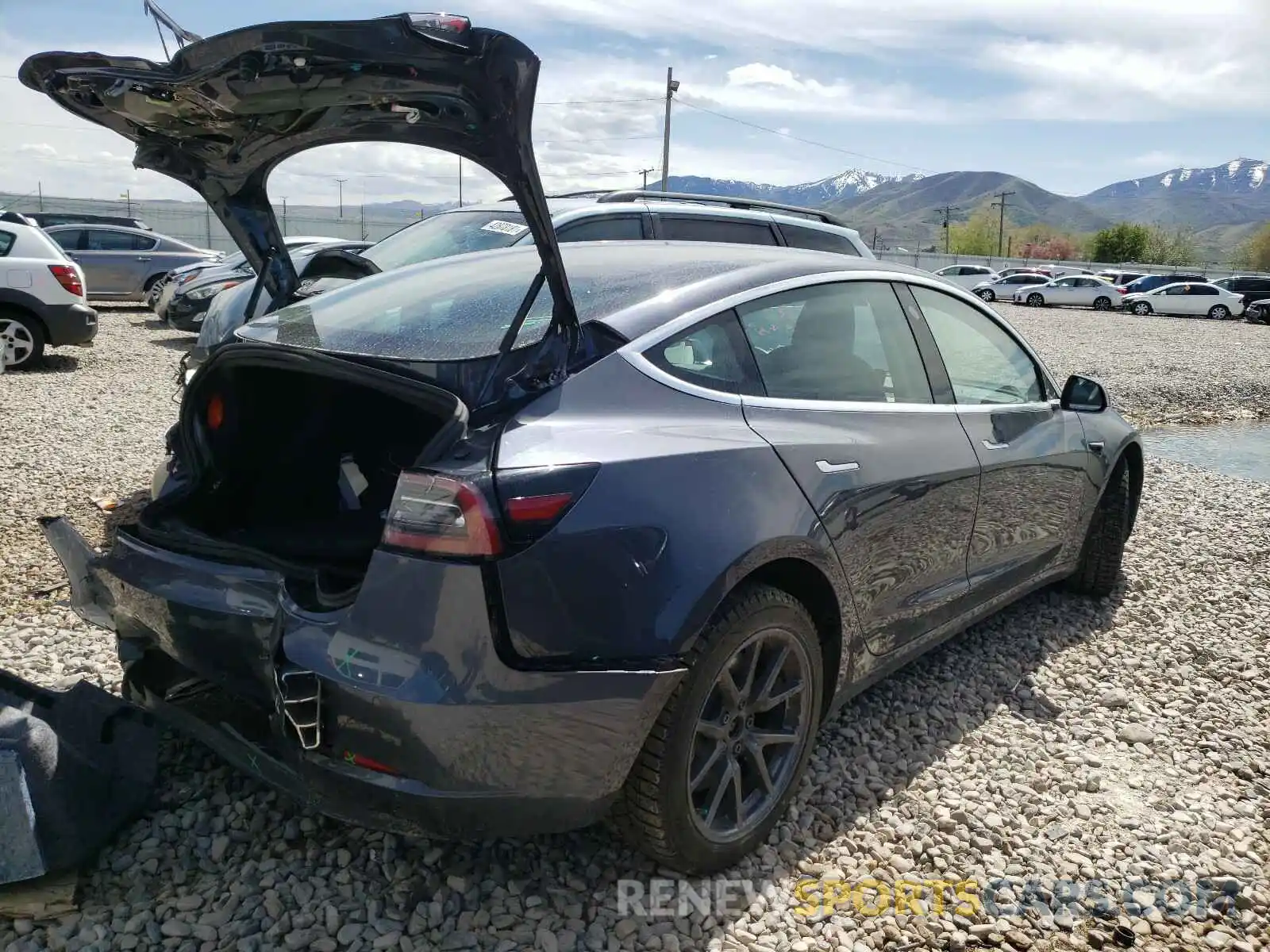 4 Photograph of a damaged car 5YJ3E1EB2LF663378 TESLA MODEL 3 2020