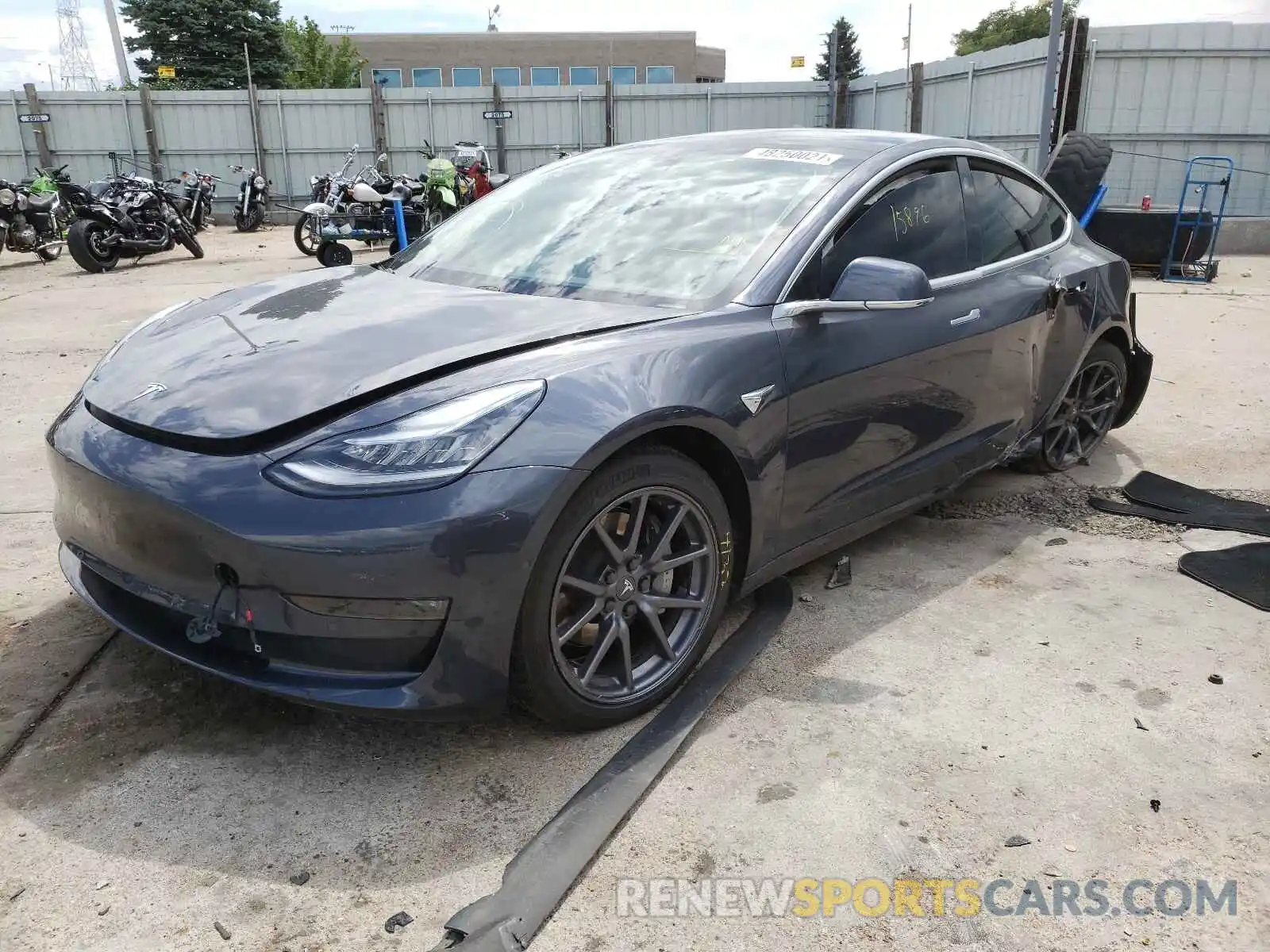 2 Photograph of a damaged car 5YJ3E1EB2LF663459 TESLA MODEL 3 2020