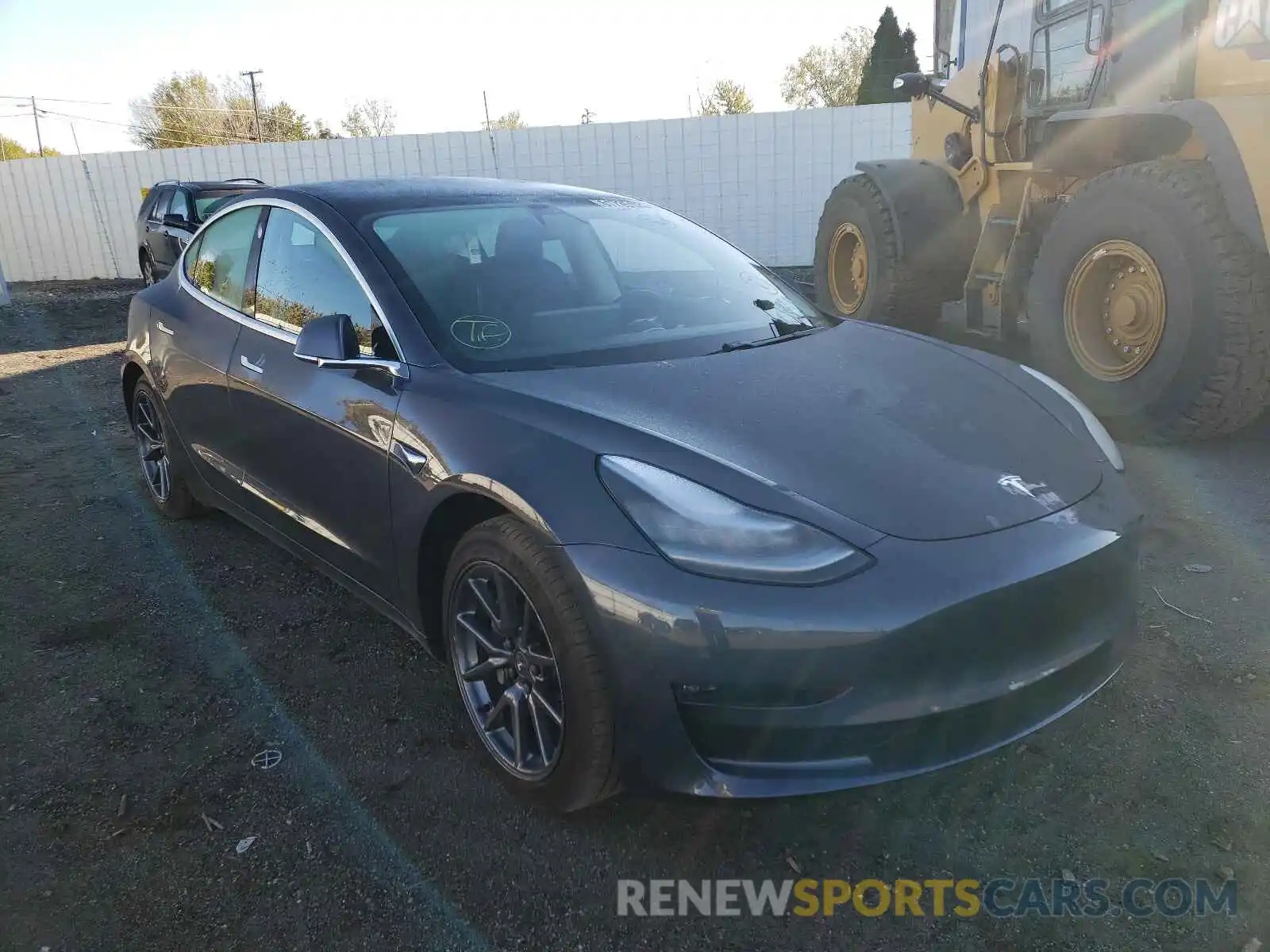 1 Photograph of a damaged car 5YJ3E1EB2LF663574 TESLA MODEL 3 2020