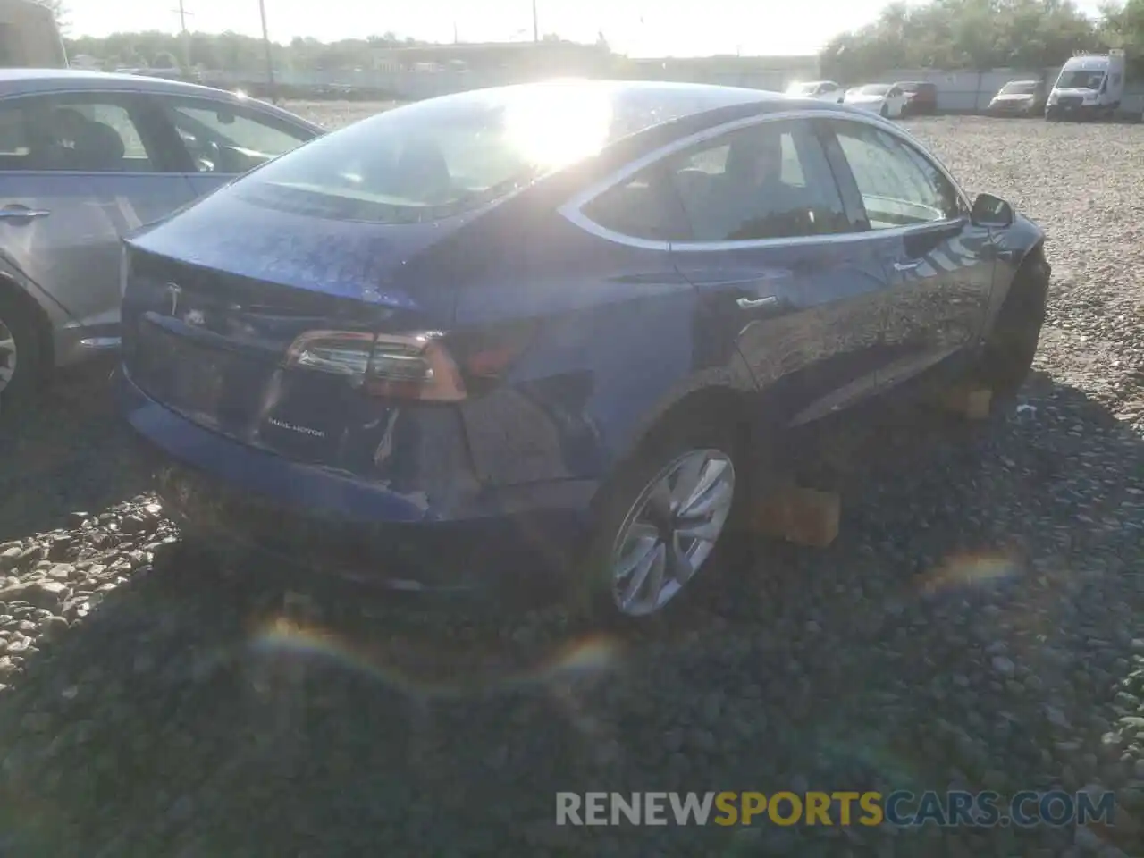 4 Photograph of a damaged car 5YJ3E1EB2LF667060 TESLA MODEL 3 2020