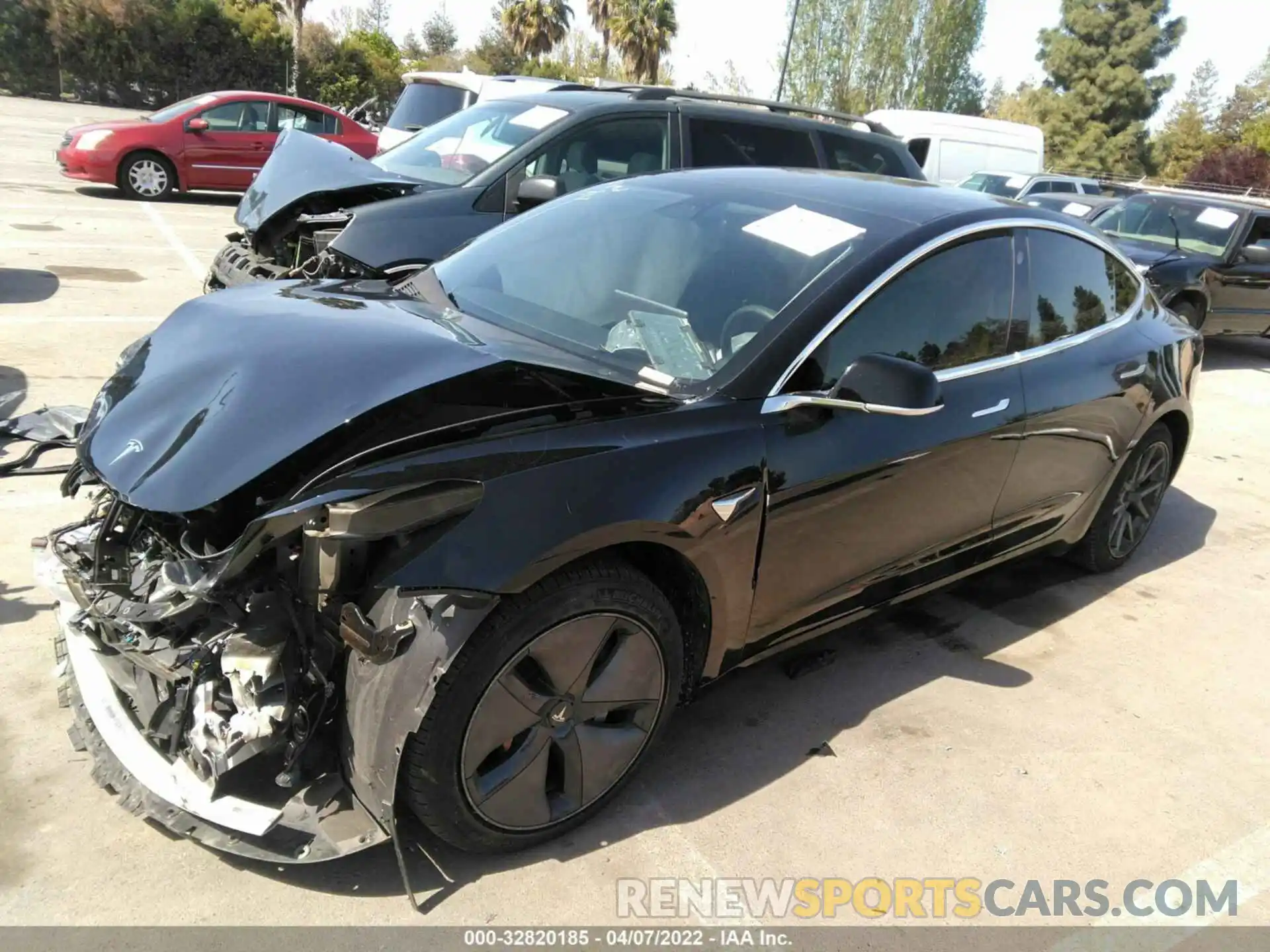 2 Photograph of a damaged car 5YJ3E1EB2LF710439 TESLA MODEL 3 2020