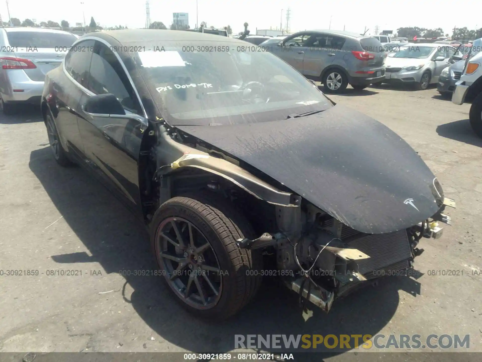 1 Photograph of a damaged car 5YJ3E1EB2LF710473 TESLA MODEL 3 2020