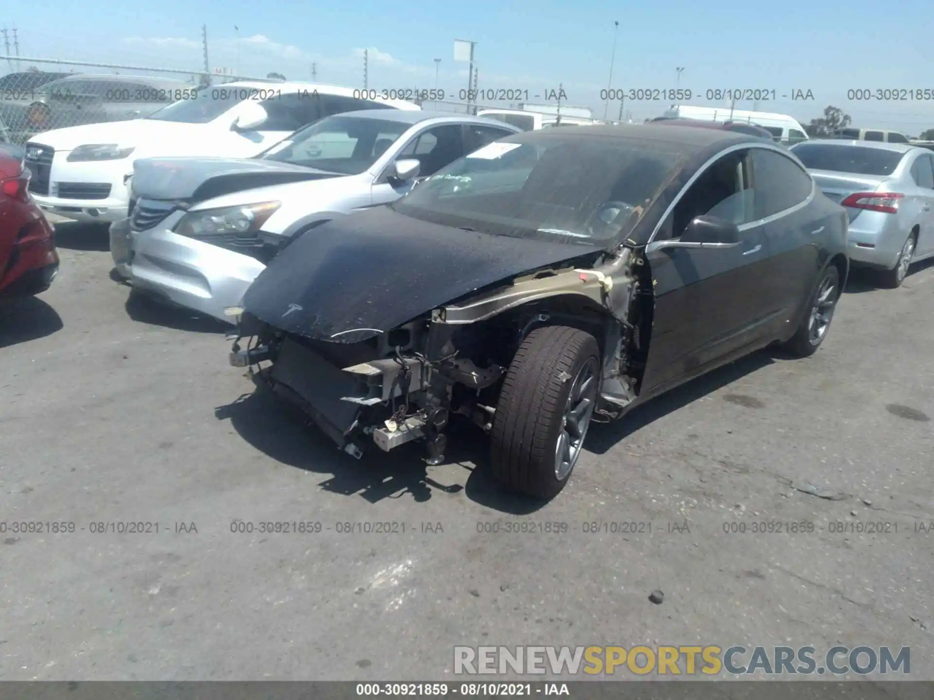 2 Photograph of a damaged car 5YJ3E1EB2LF710473 TESLA MODEL 3 2020